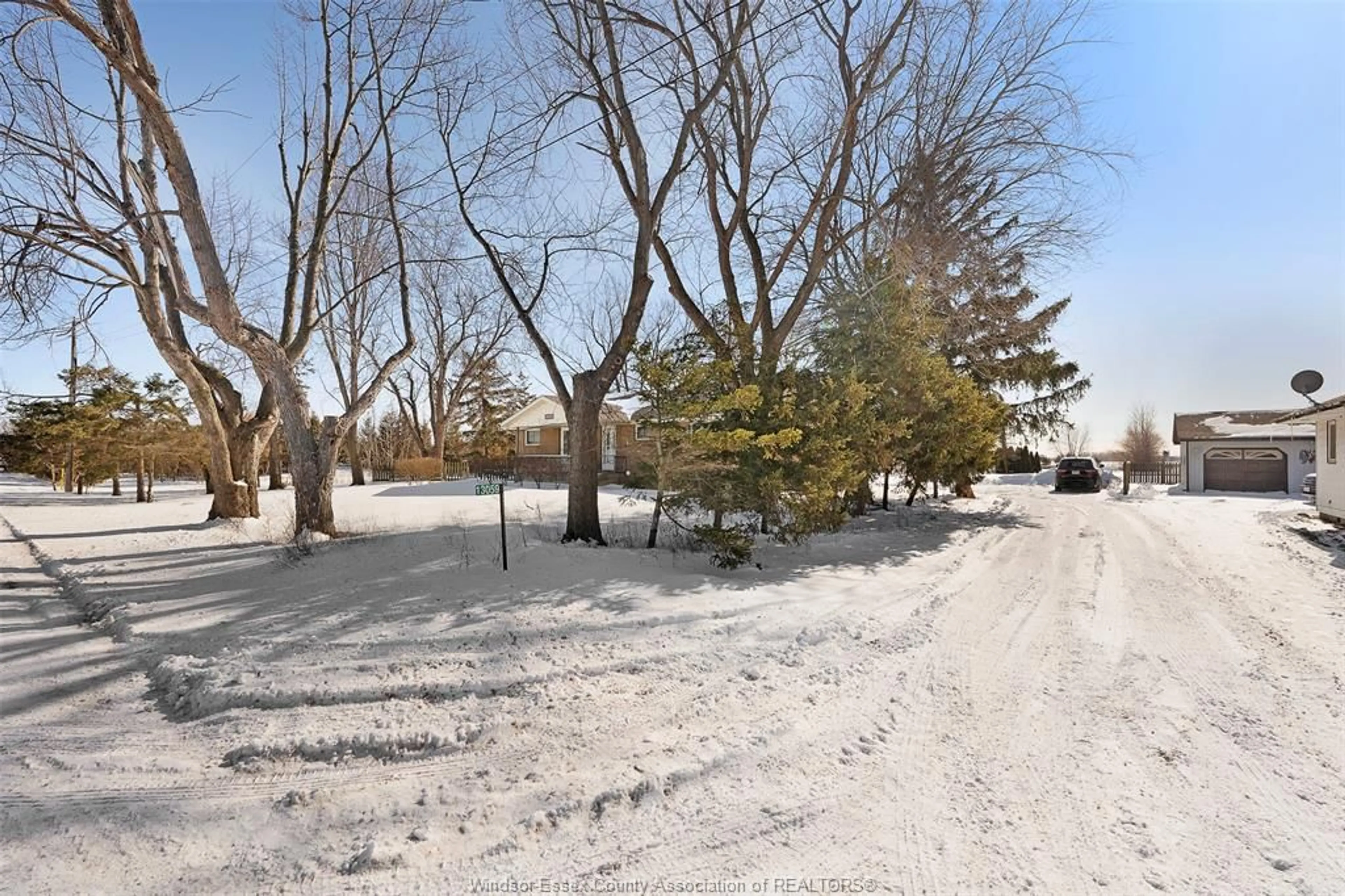 A pic from outside/outdoor area/front of a property/back of a property/a pic from drone, street for 13059 CONCESSION 13, Essex Ontario N0R 1J0