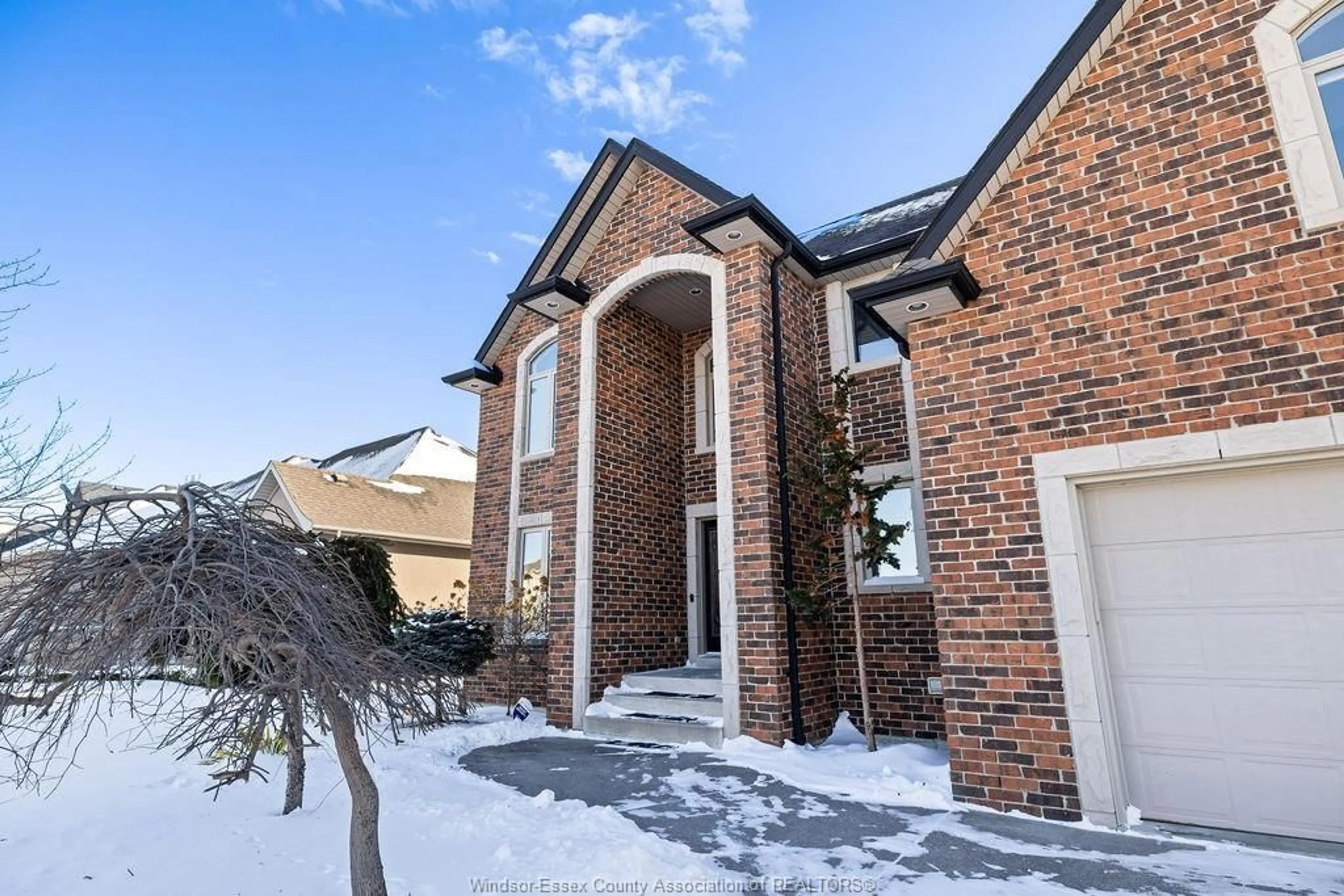 Home with brick exterior material, street for 1073 REGENCY Cres, Lakeshore Ontario N0R 1A0