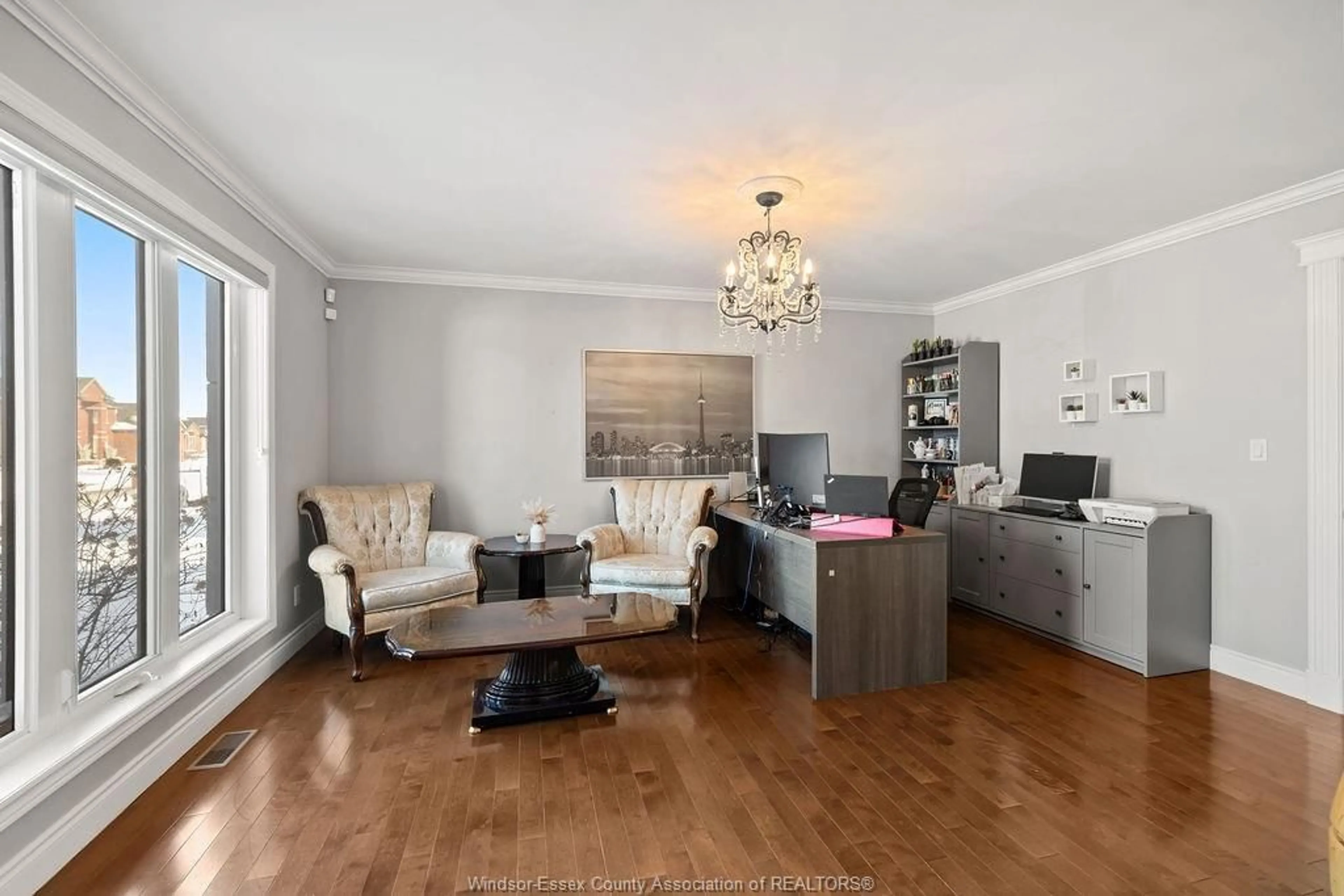 Living room with furniture, wood/laminate floor for 1073 REGENCY Cres, Lakeshore Ontario N0R 1A0