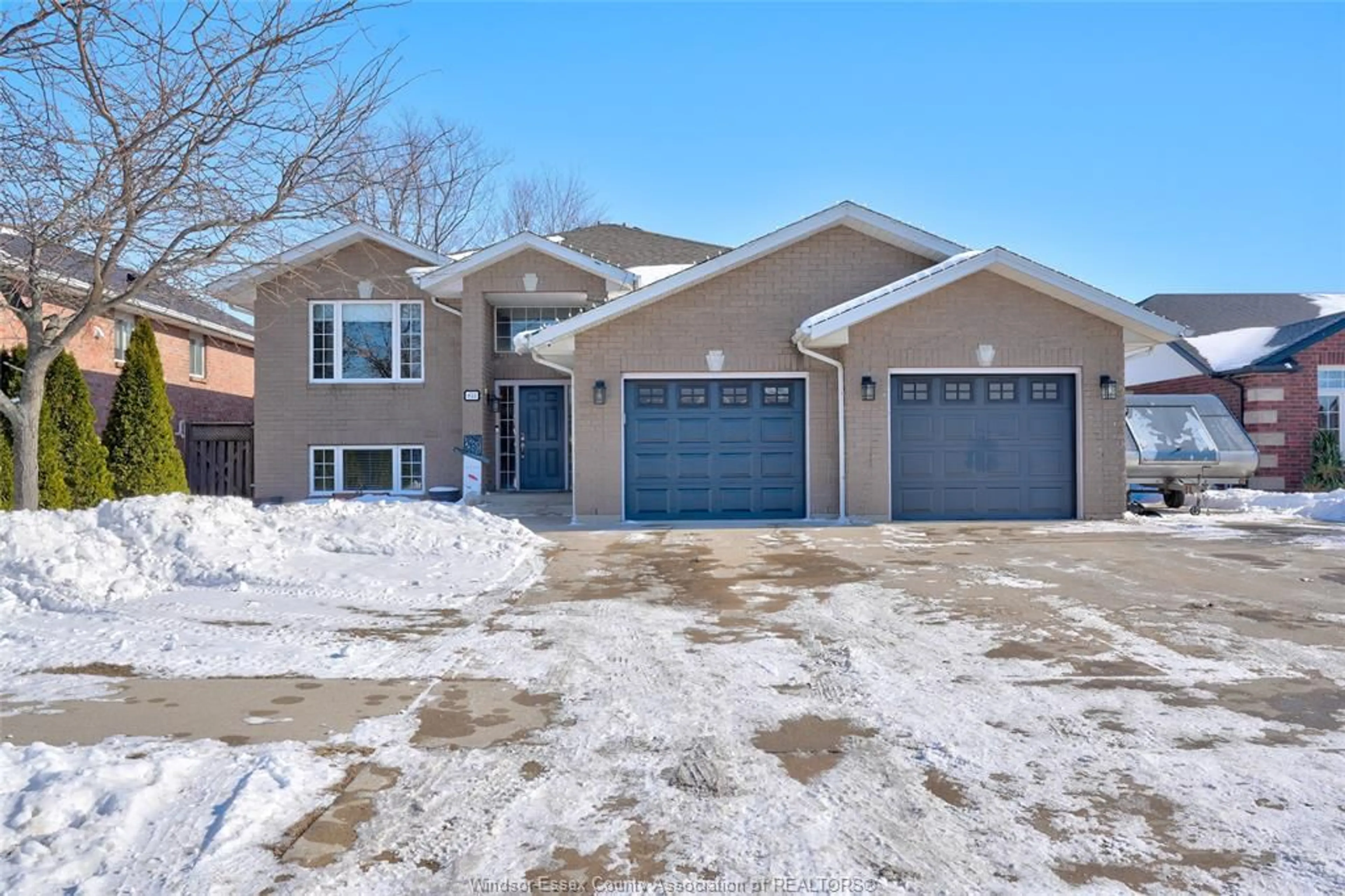 Home with brick exterior material, street for 833 SOUTHWOOD Dr, Lakeshore Ontario N8L 1G1