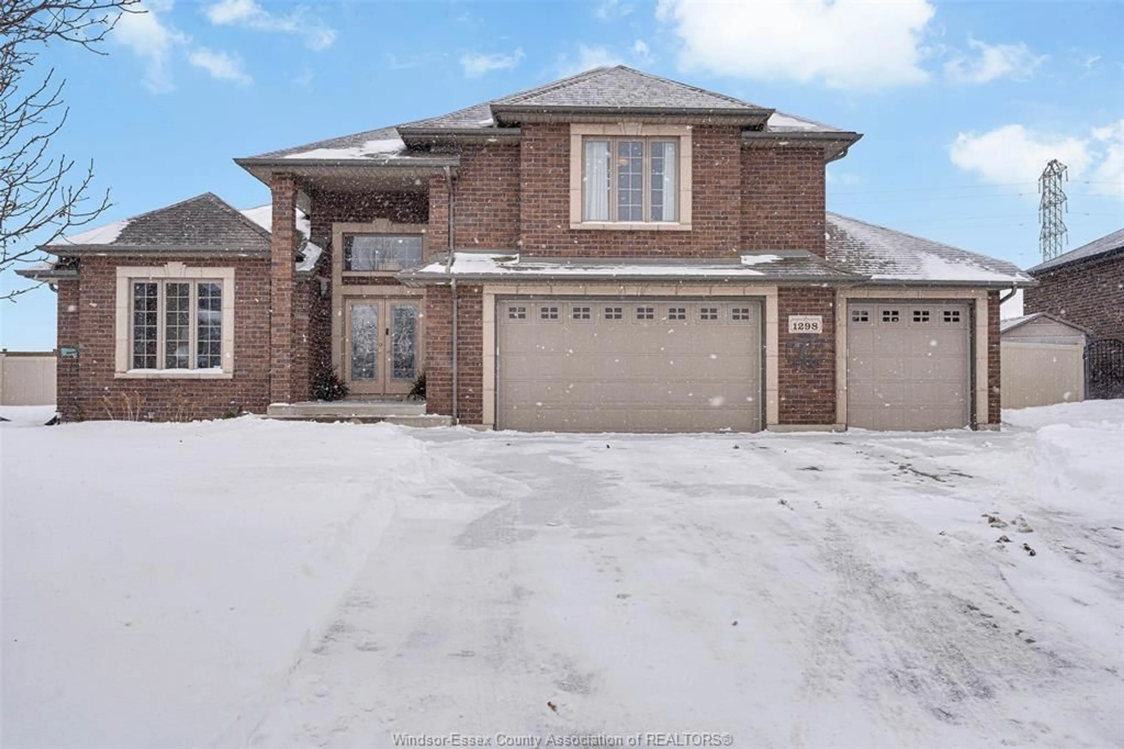 Home with brick exterior material, street for 1298 DEER RUN Trail, Lakeshore Ontario N8L 0S8