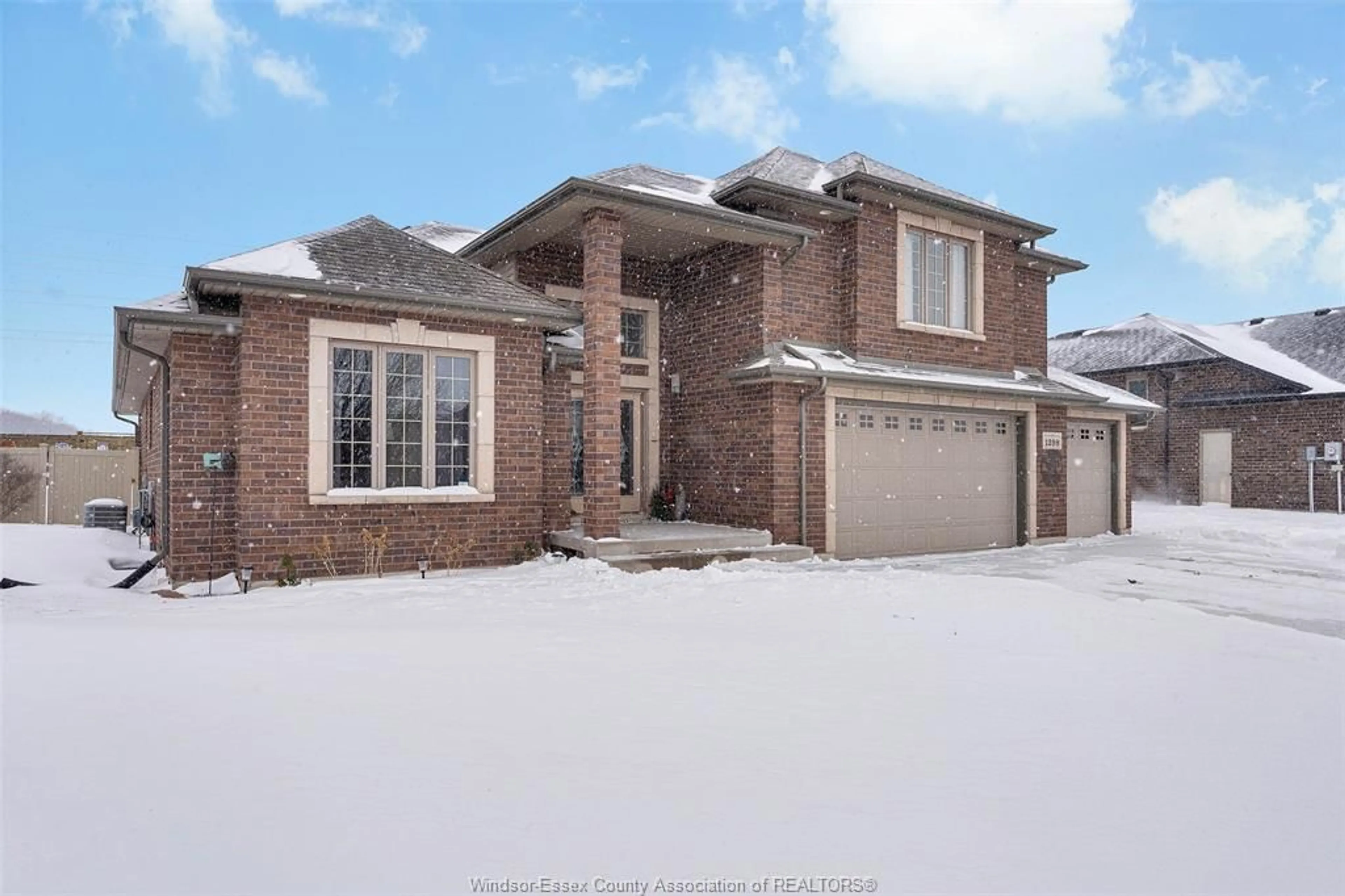 Home with brick exterior material, street for 1298 DEER RUN Trail, Lakeshore Ontario N8L 0S8