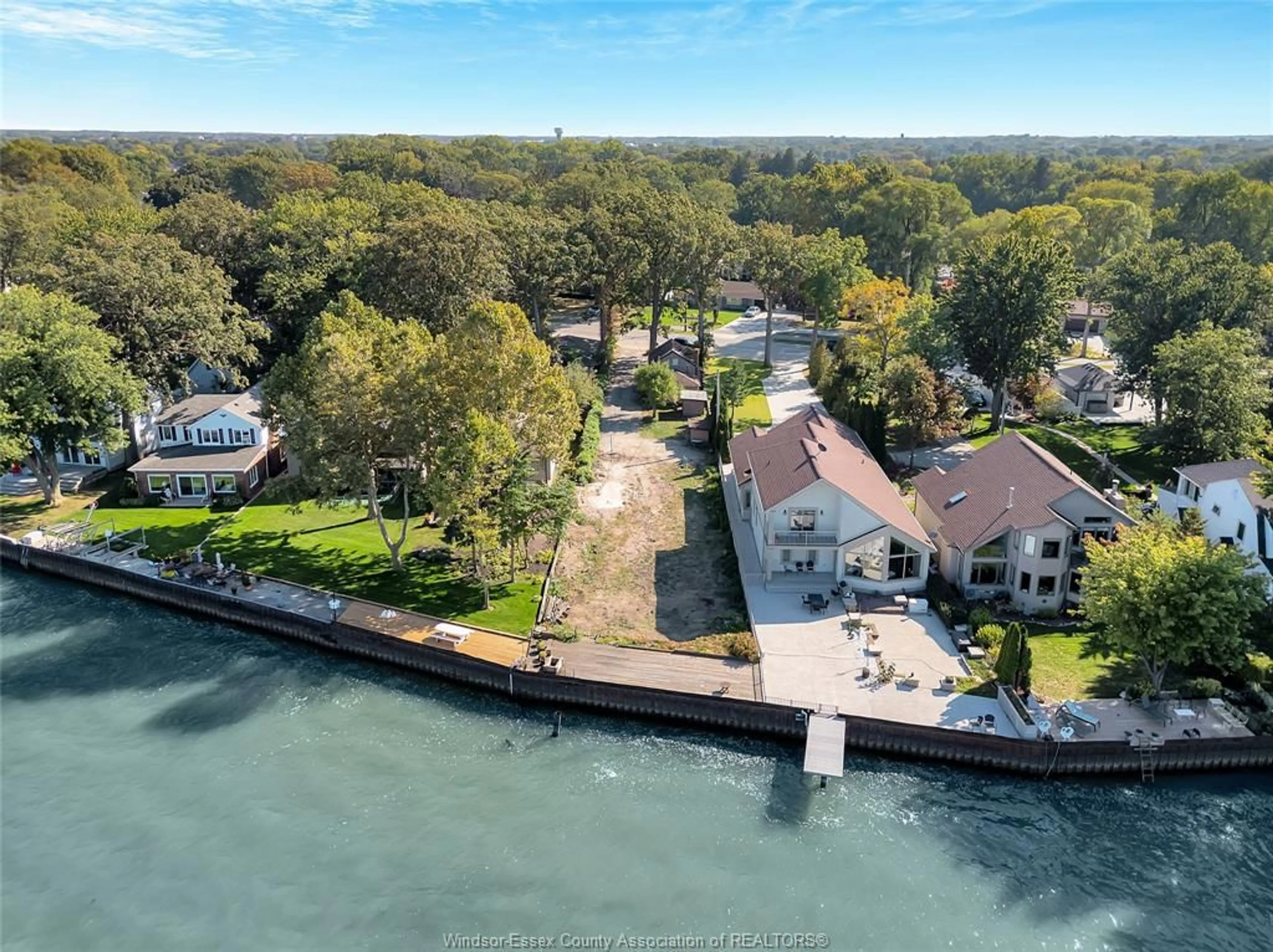 A pic from outside/outdoor area/front of a property/back of a property/a pic from drone, water/lake/river/ocean view for 12718-12722 RIVERSIDE Dr, Tecumseh Ontario N8N 1A7