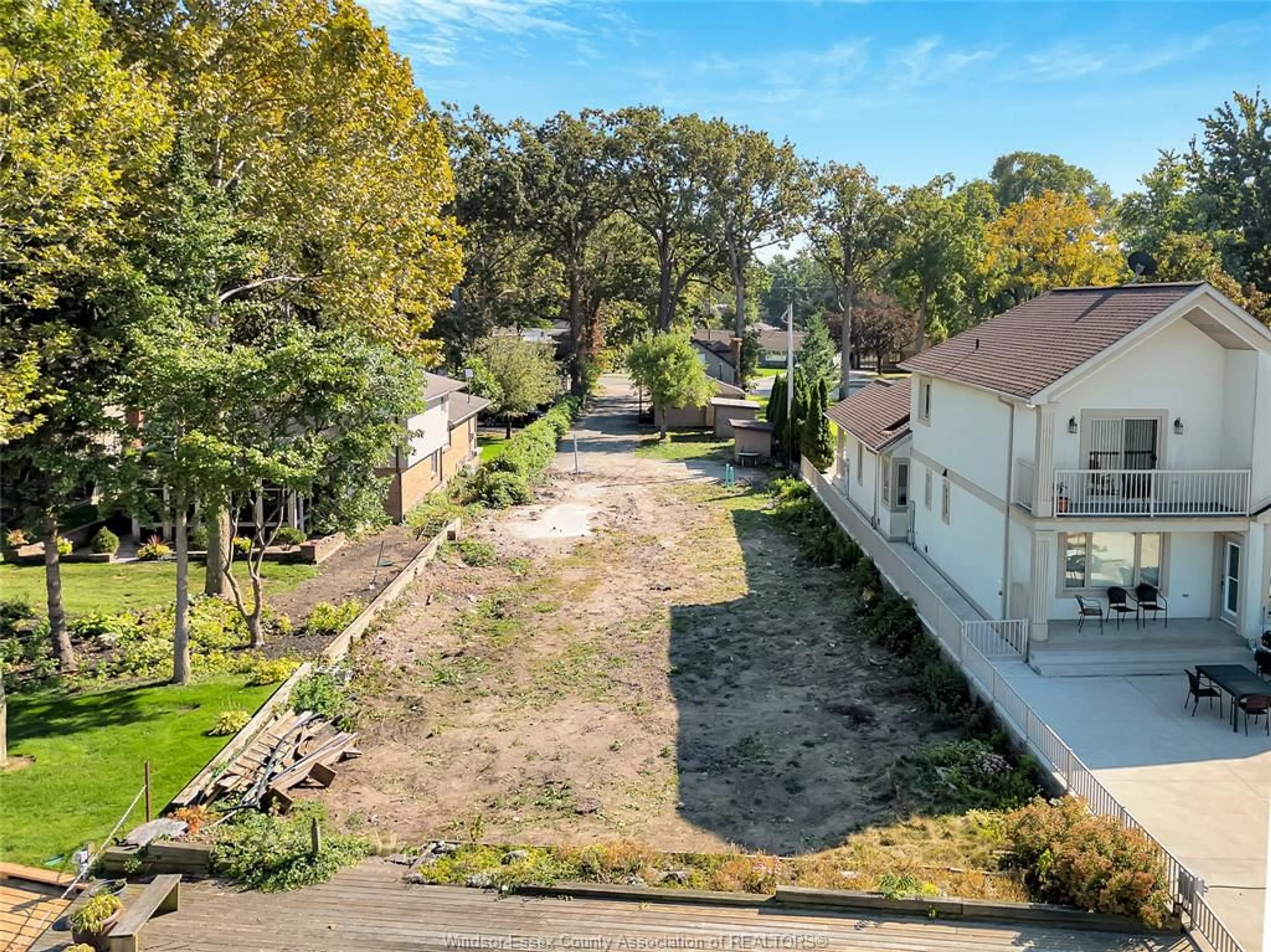 A pic from outside/outdoor area/front of a property/back of a property/a pic from drone, street for 12718-12722 RIVERSIDE Dr, Tecumseh Ontario N8N 1A7