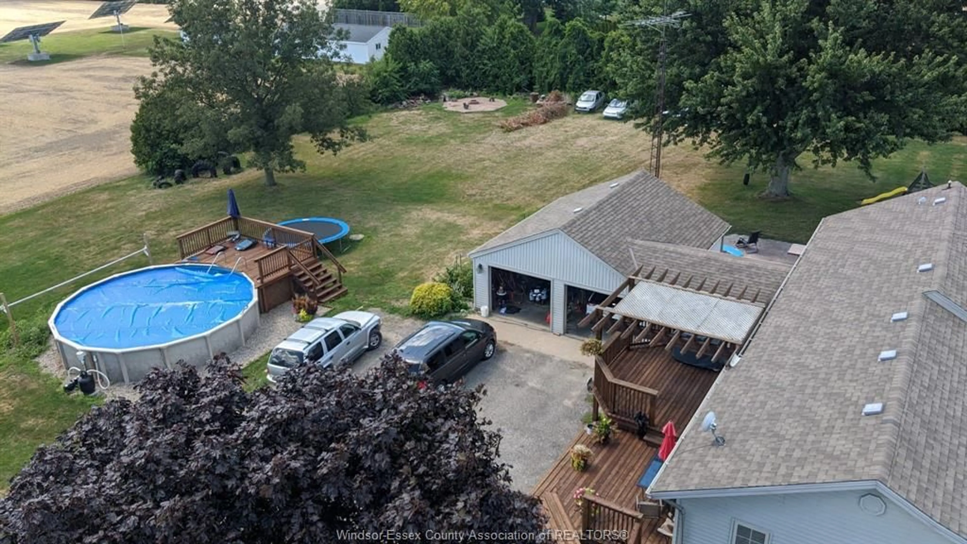 A pic from outside/outdoor area/front of a property/back of a property/a pic from drone, water/lake/river/ocean view for 1324 MERSEA RD 1, Leamington Ontario N8H 3V7