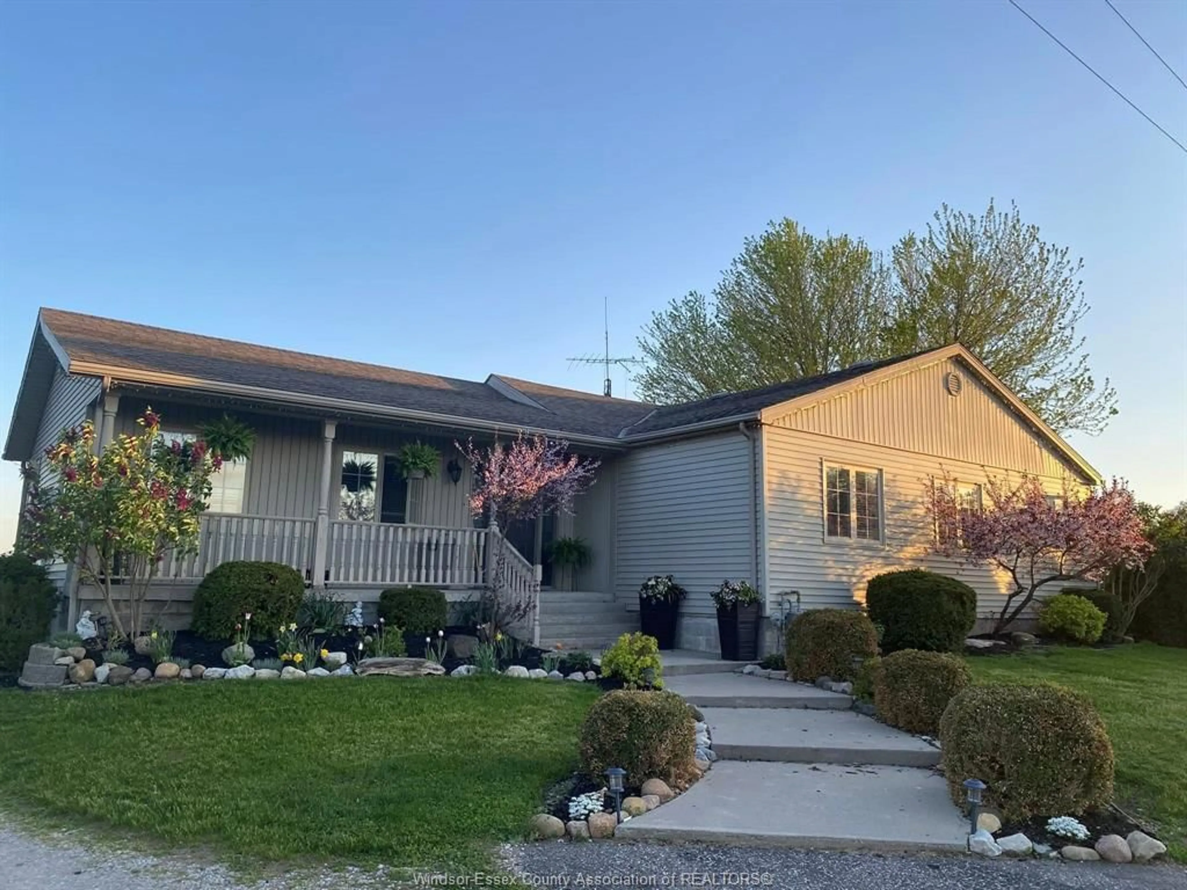 Home with vinyl exterior material, street for 1324 MERSEA RD 1, Leamington Ontario N8H 3V7