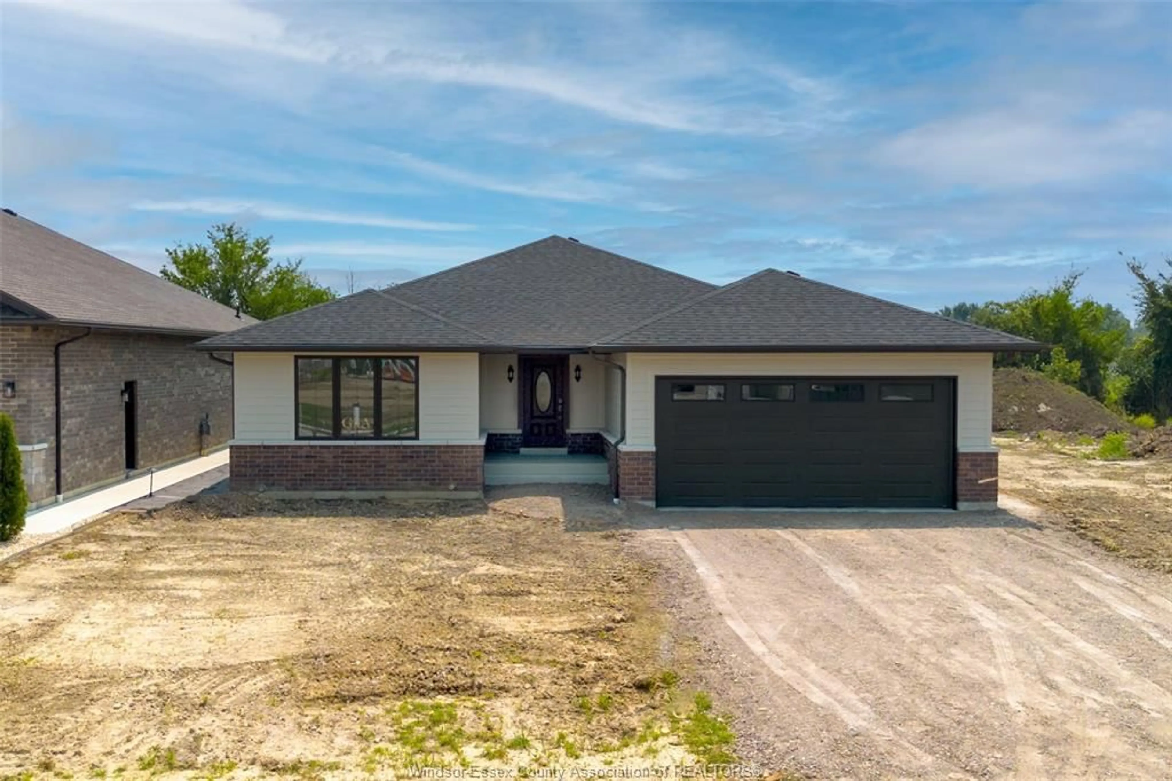 Home with brick exterior material, street for 68 BELLEVIEW Dr, Kingsville Ontario N0R 1B0