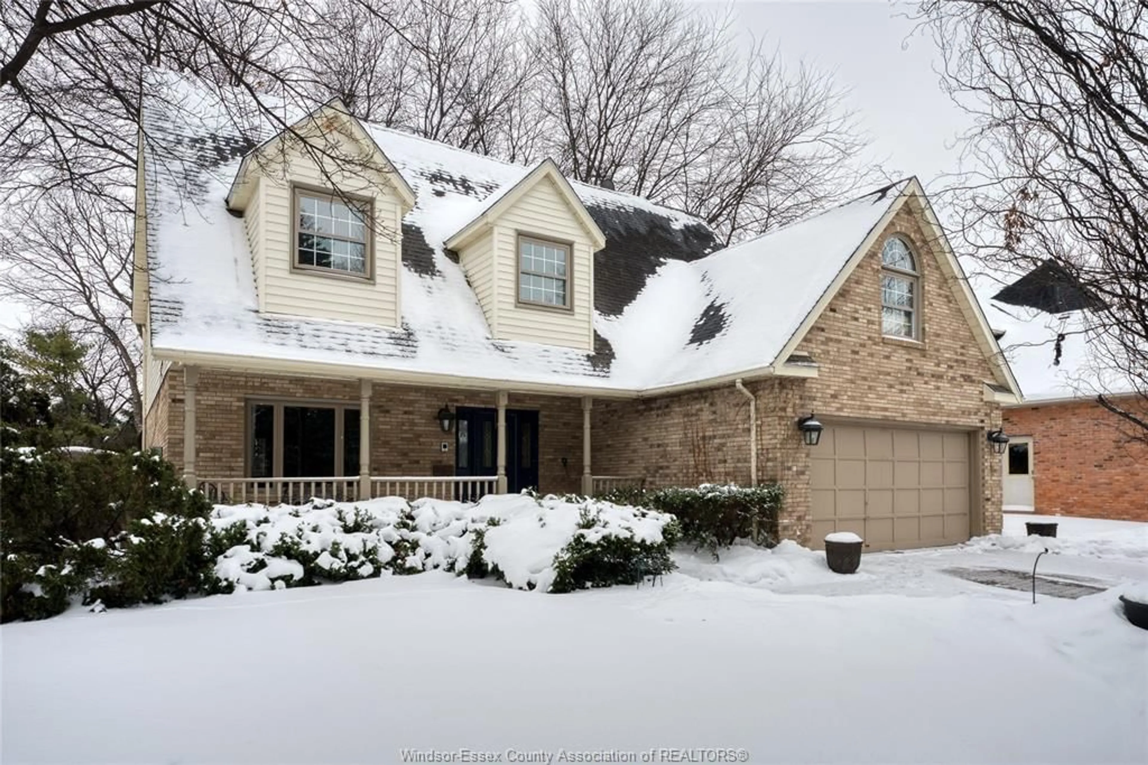 Home with brick exterior material, street for 323 MAJESTIC Dr, Lakeshore Ontario N8N 4K9