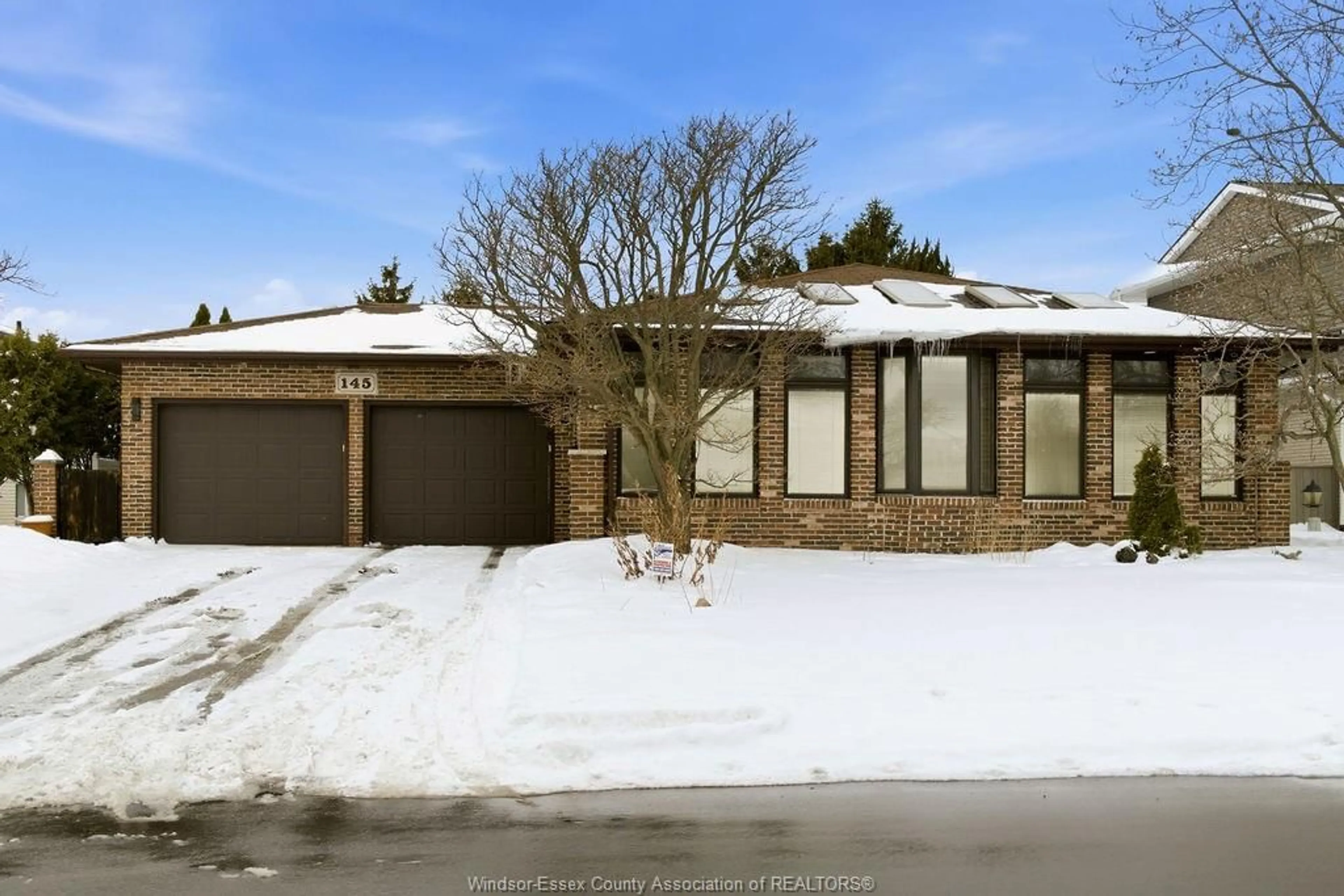 Home with brick exterior material, street for 145 CENTENNIAL DRIVE, Tecumseh Ontario N8N 2N7