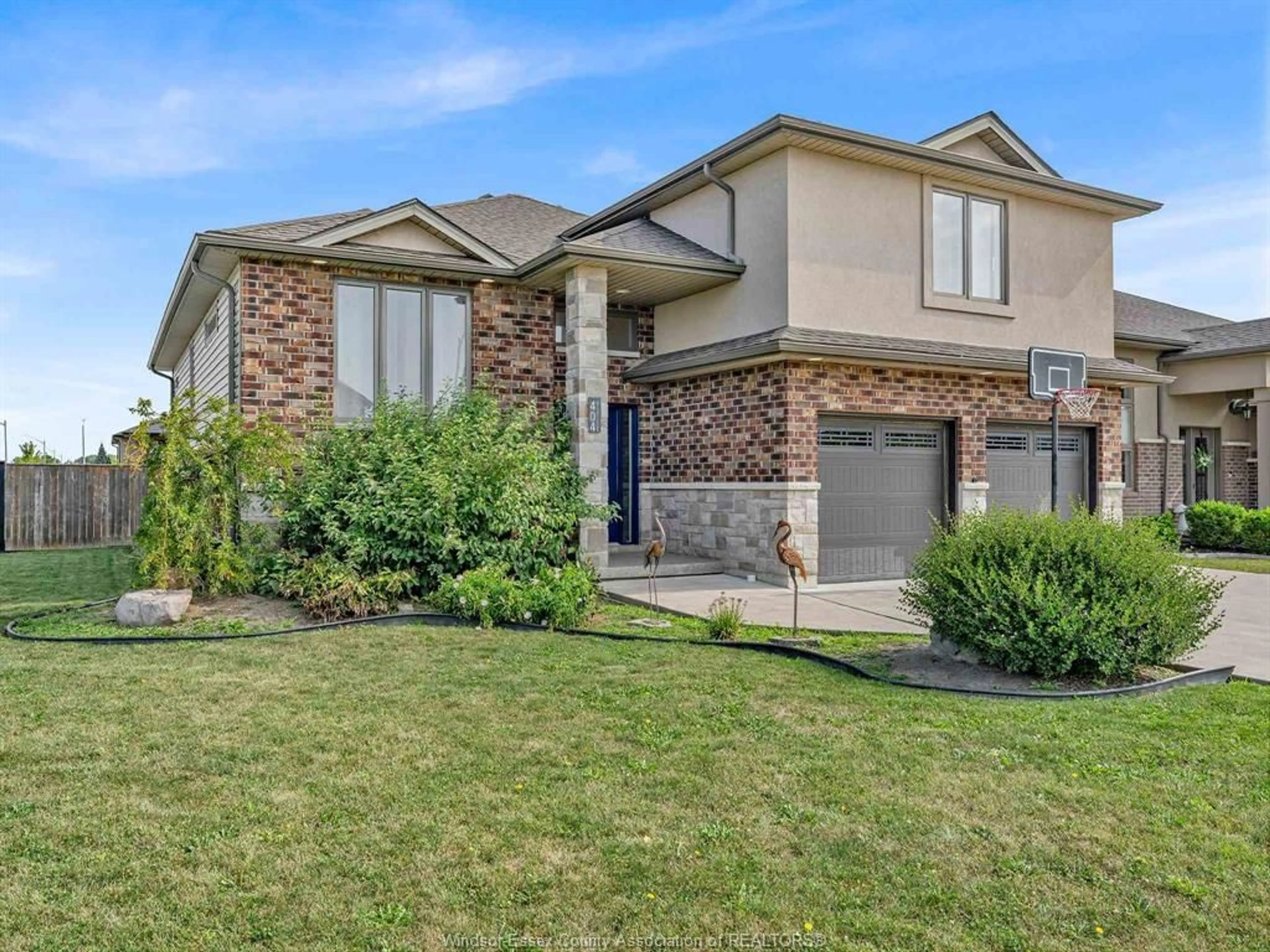 Home with brick exterior material, street for 404 Brown, Amherstburg Ontario N9V 0C2