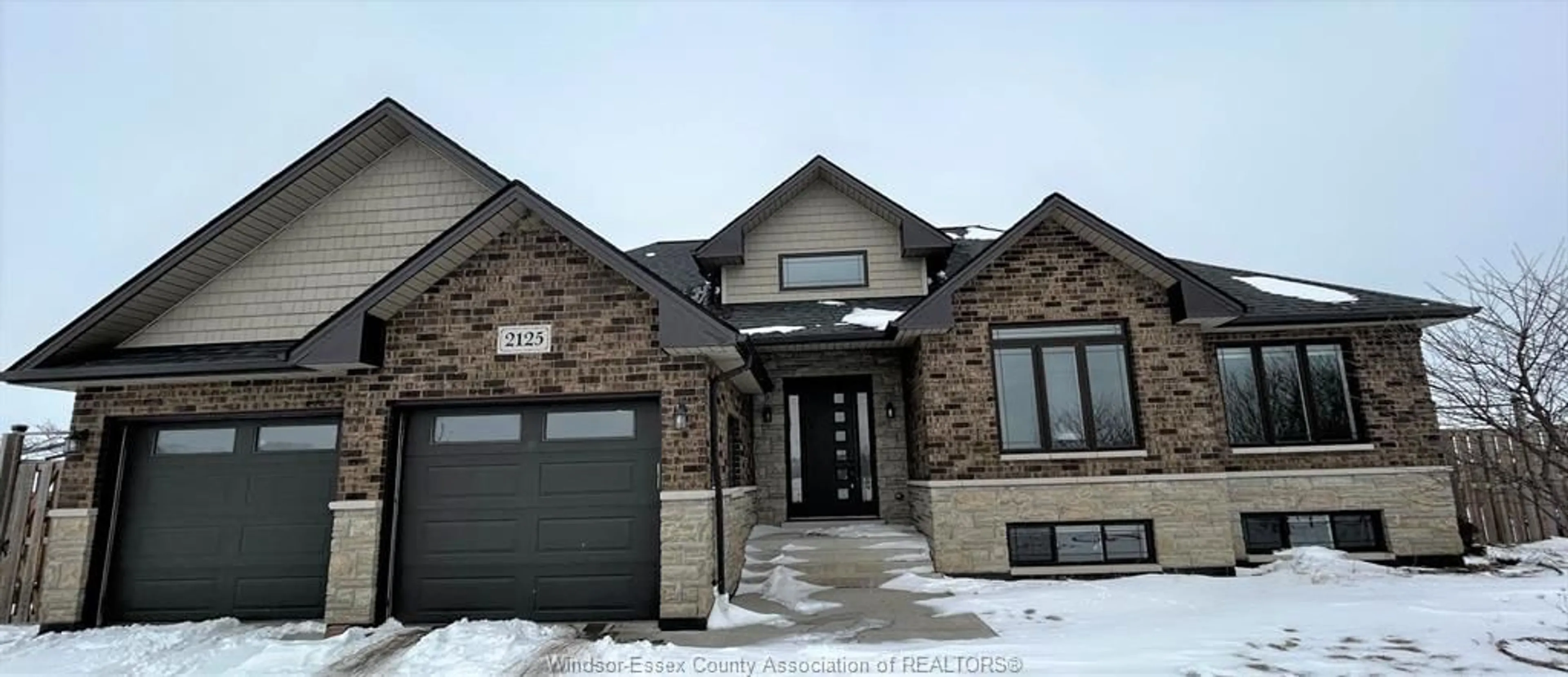 Home with brick exterior material, street for 2125 FOX RUN Rd, Leamington Ontario N8H 3V7