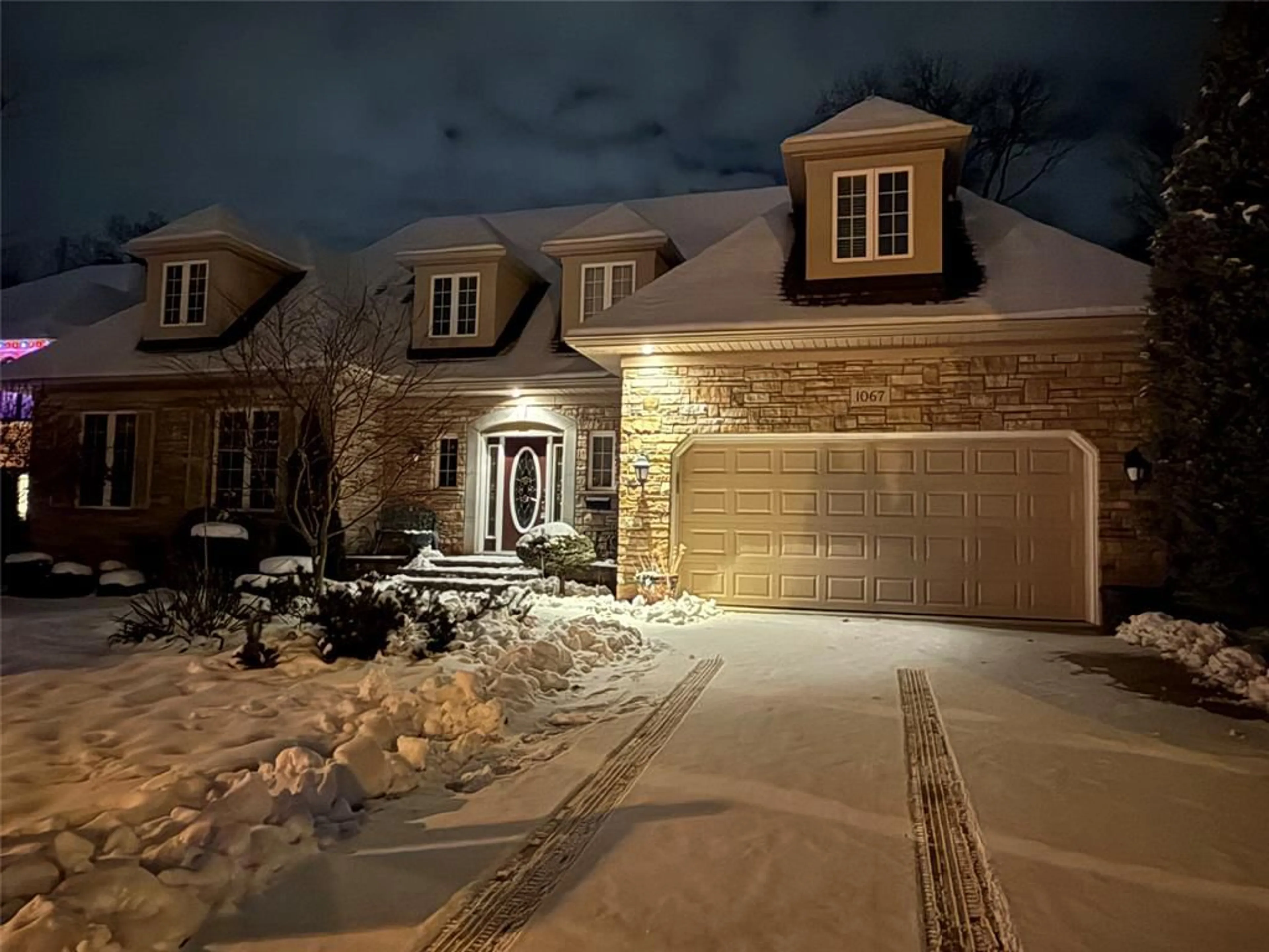 Home with brick exterior material, street for 1067 FORESTVALE Dr, Burlington Ontario L7P 4W4