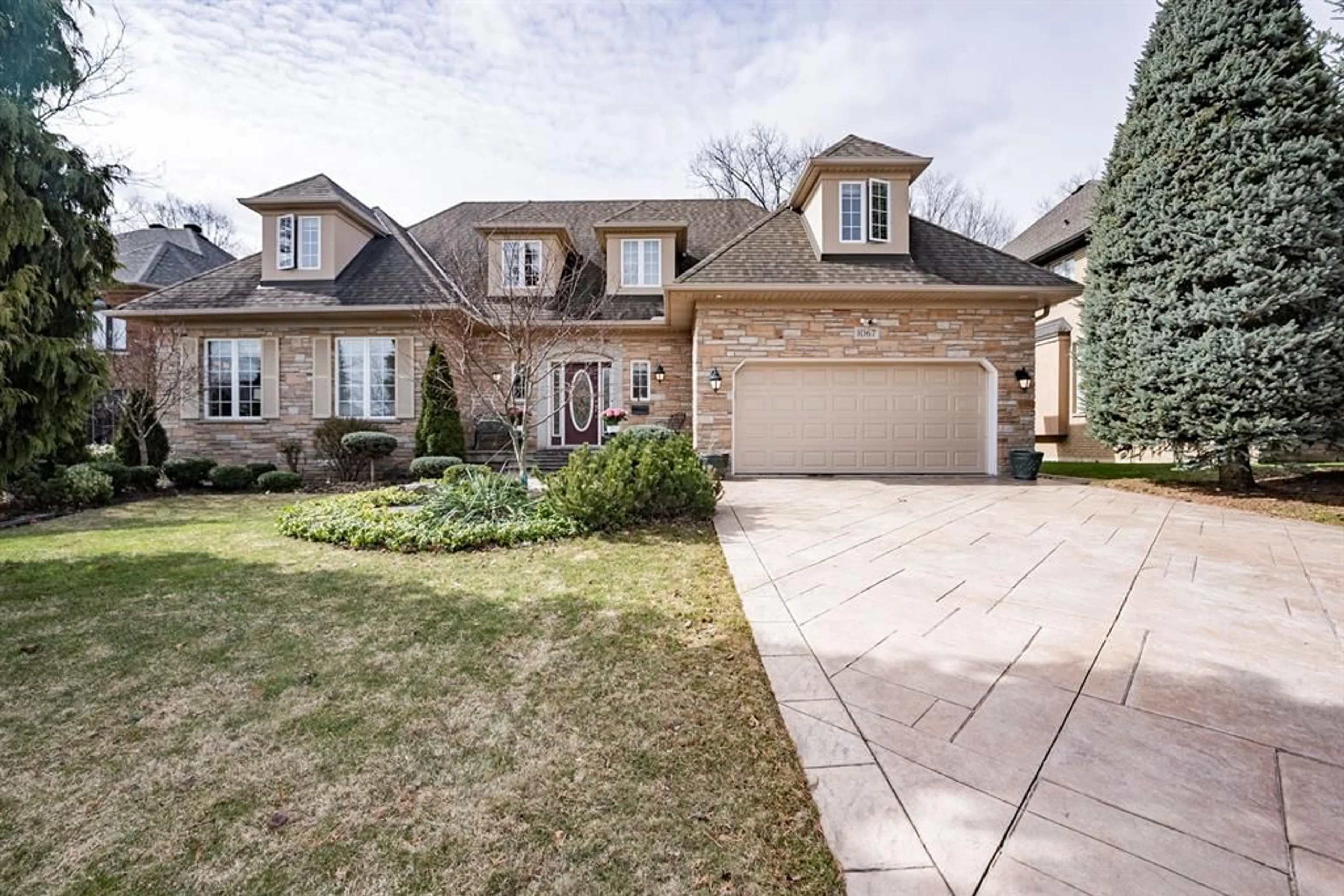Home with brick exterior material, street for 1067 FORESTVALE Dr, Burlington Ontario L7P 4W4