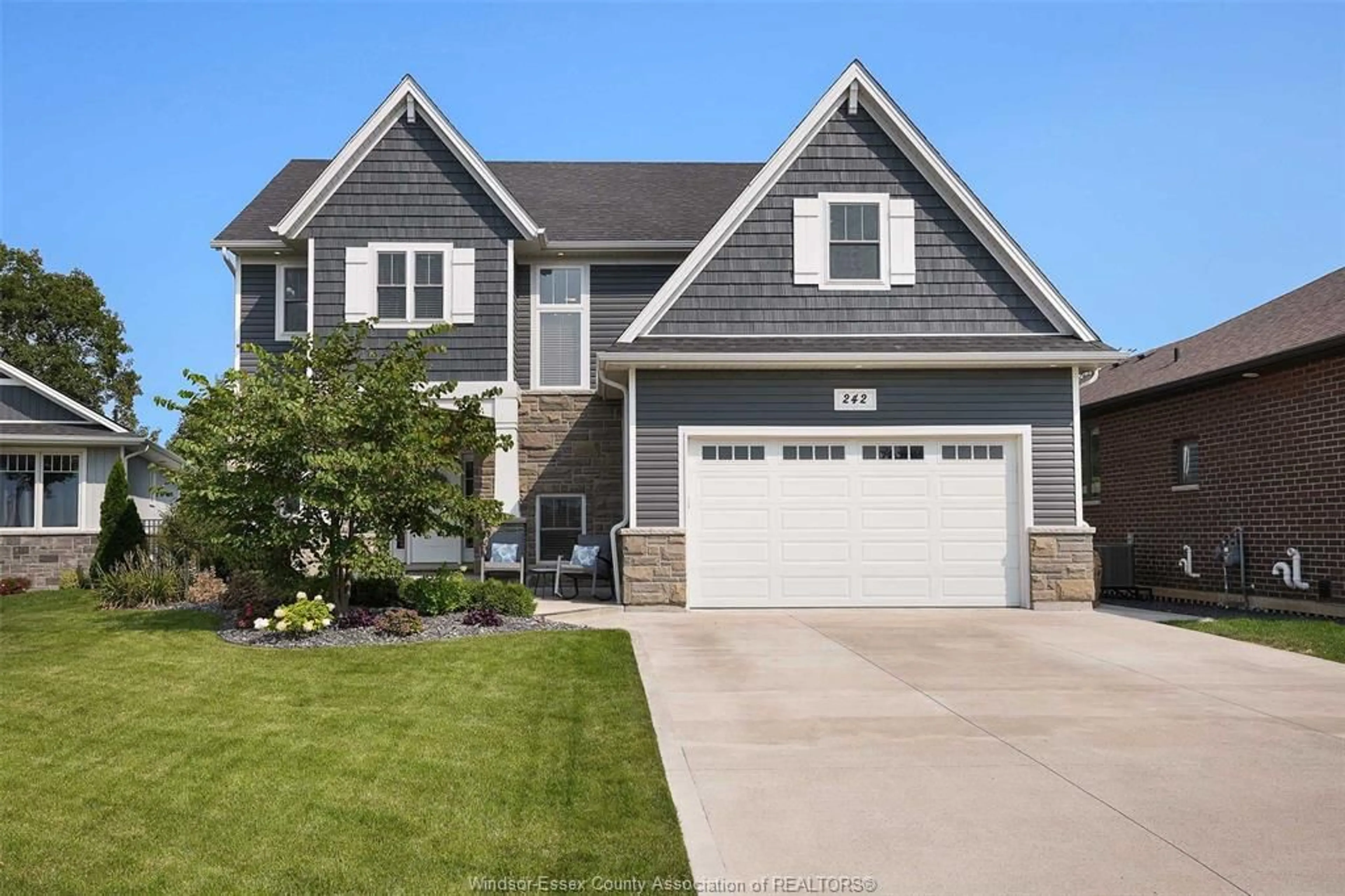 Home with vinyl exterior material, street for 242 MEADOWVIEW Ave, Amherstburg Ontario N0R 1G0