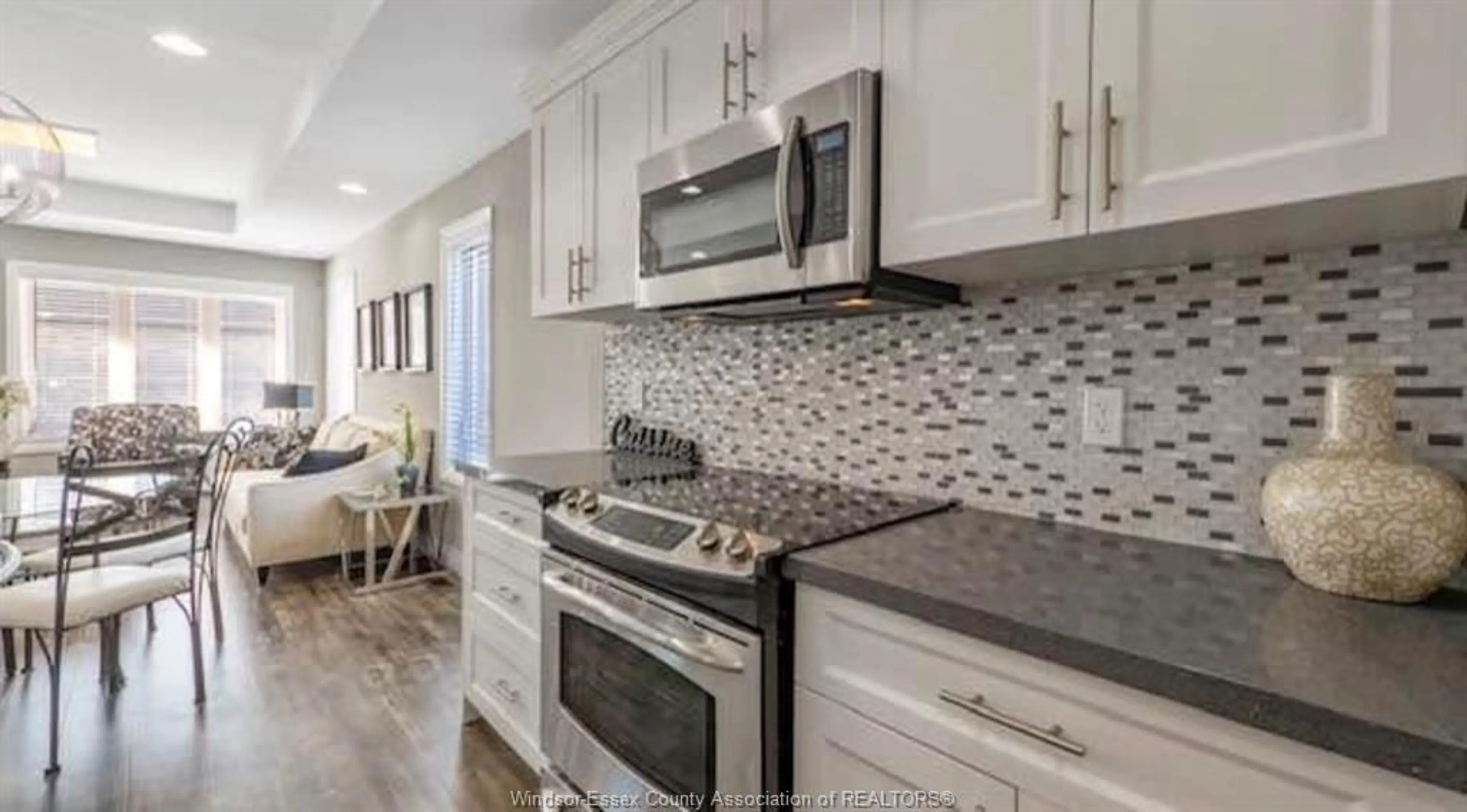 Open concept kitchen, ceramic/tile floor for 3501 HALLEE Cres, Windsor Ontario N8W 5P2