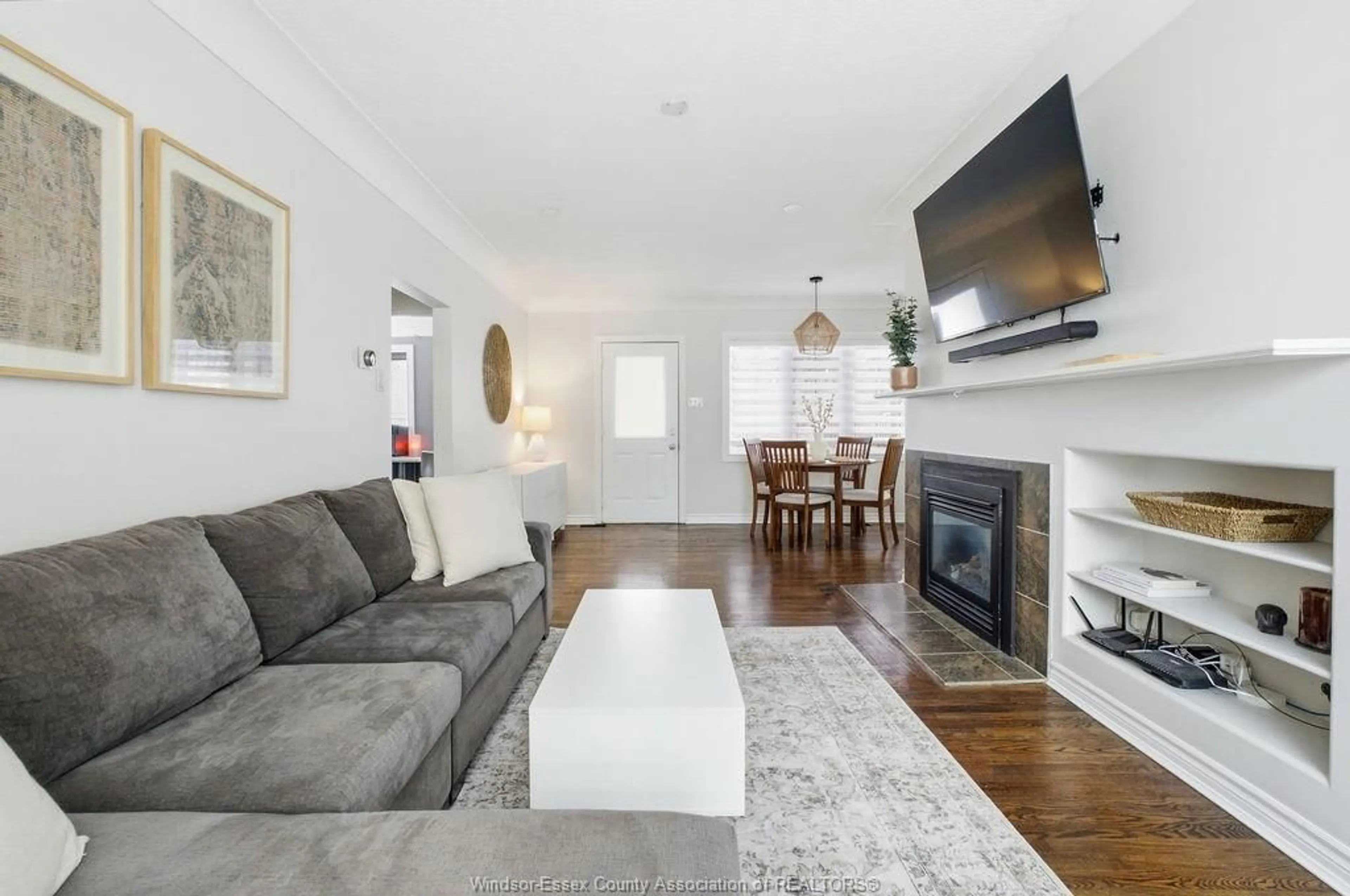 Living room with furniture, wood/laminate floor for 452 RIVERDALE Ave, Windsor Ontario N8S 4B6