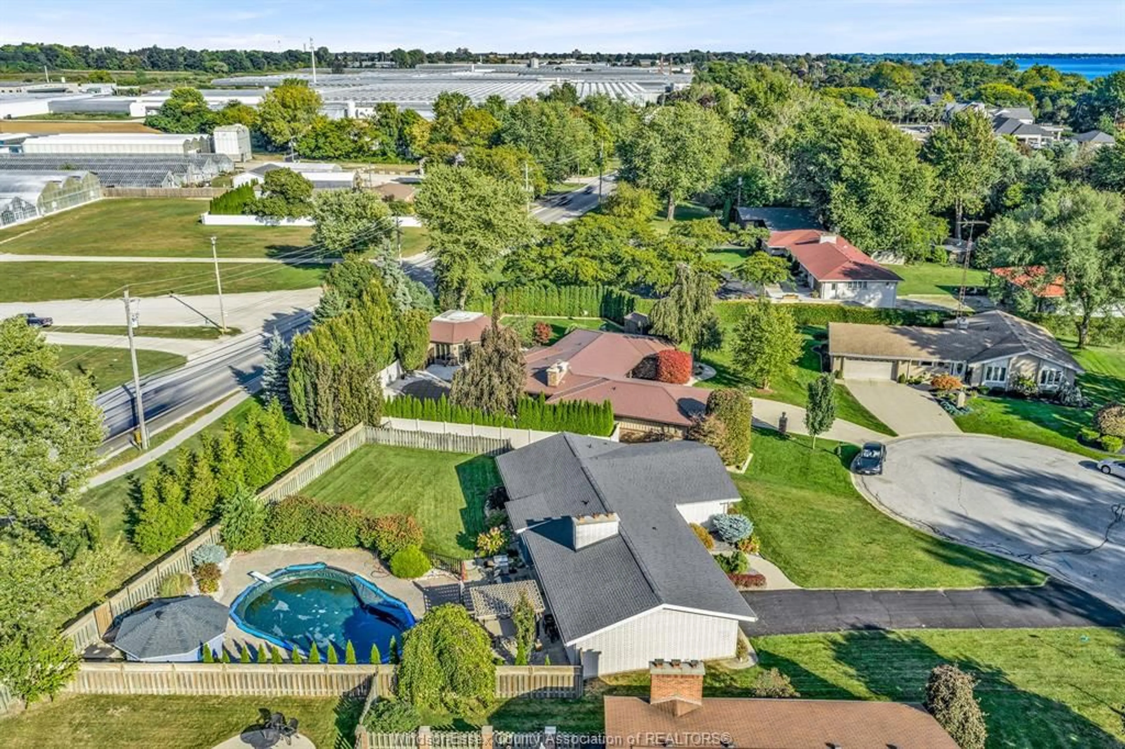 A pic from outside/outdoor area/front of a property/back of a property/a pic from drone, water/lake/river/ocean view for 7 LONGBEACH Dr, Leamington Ontario N8H 4H9