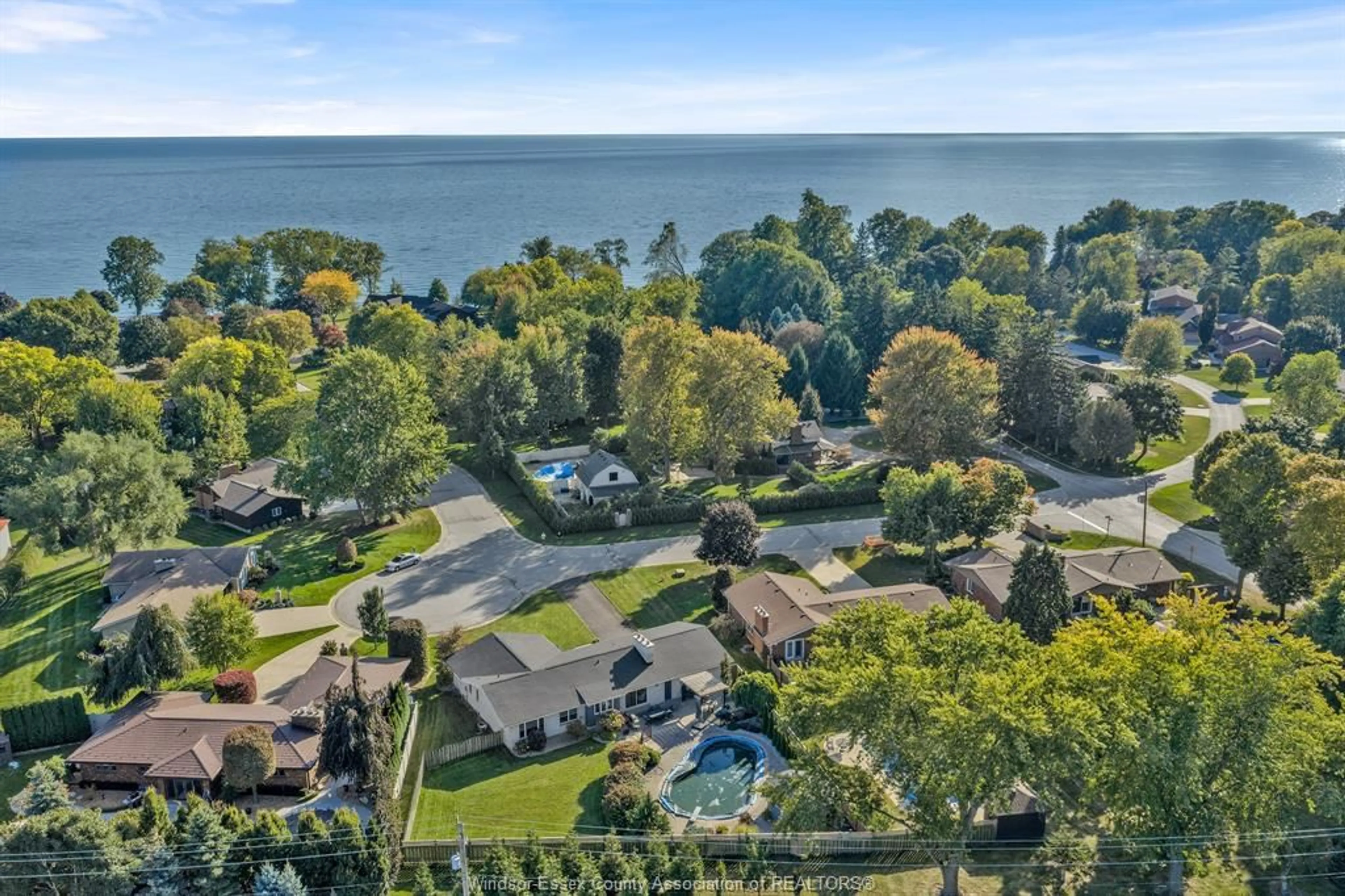 A pic from outside/outdoor area/front of a property/back of a property/a pic from drone, water/lake/river/ocean view for 7 LONGBEACH Dr, Leamington Ontario N8H 4H9