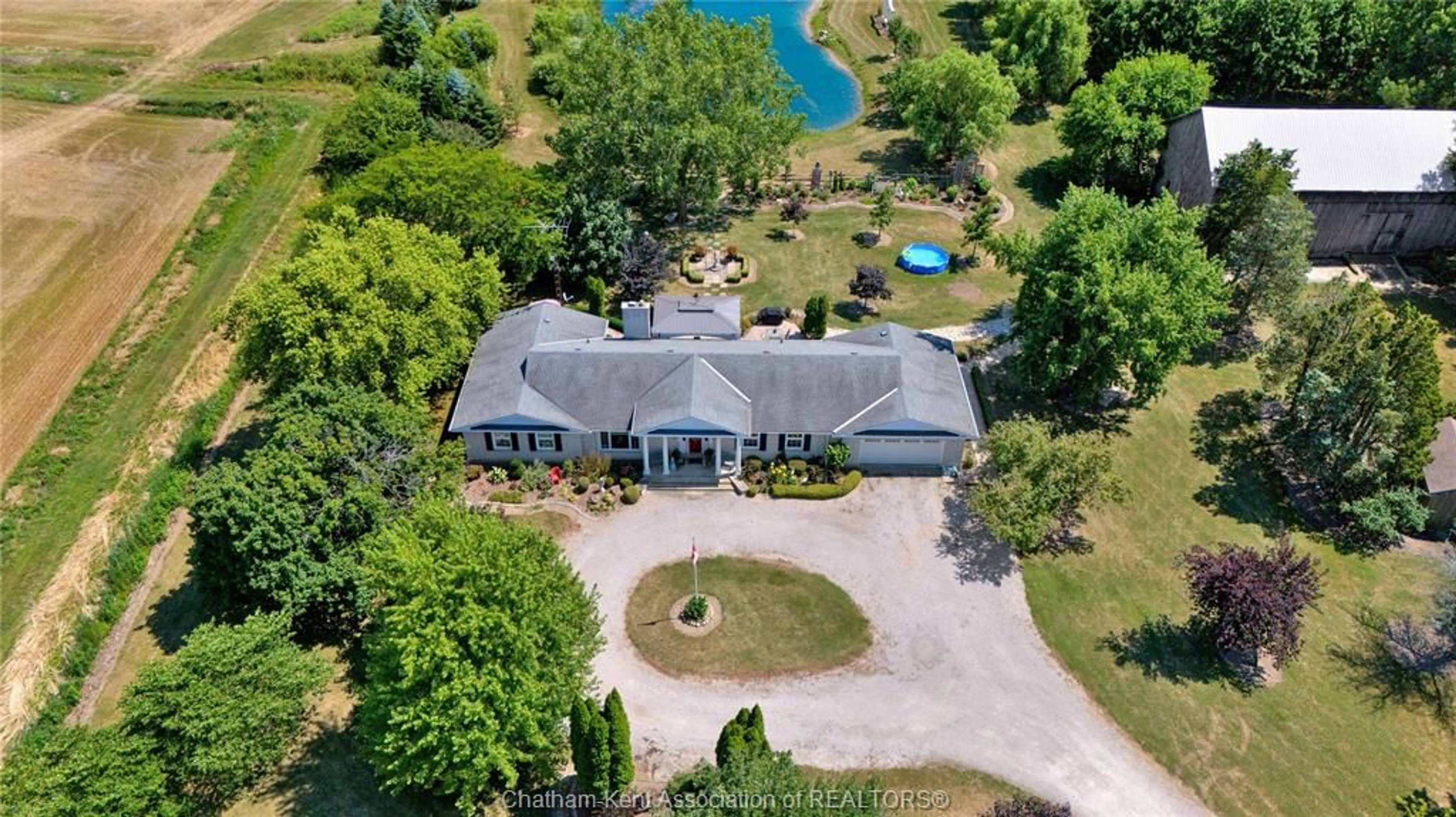 A pic from outside/outdoor area/front of a property/back of a property/a pic from drone, water/lake/river/ocean view for 7598 Middle Line, Charing Cross Ontario N0P 1G0
