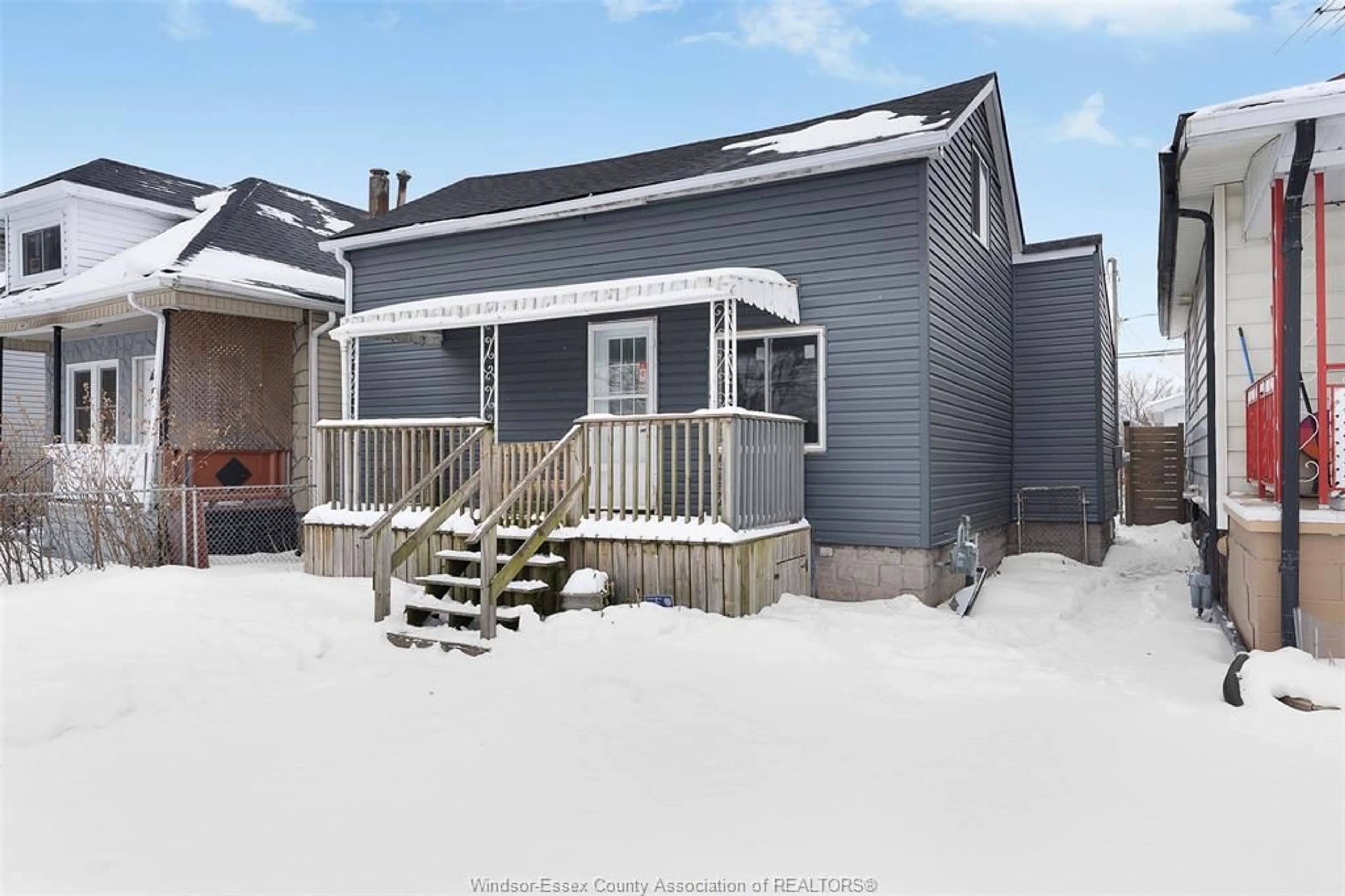 Home with vinyl exterior material, street for 1055 HIGHLAND Ave, Windsor Ontario N9A 1R6