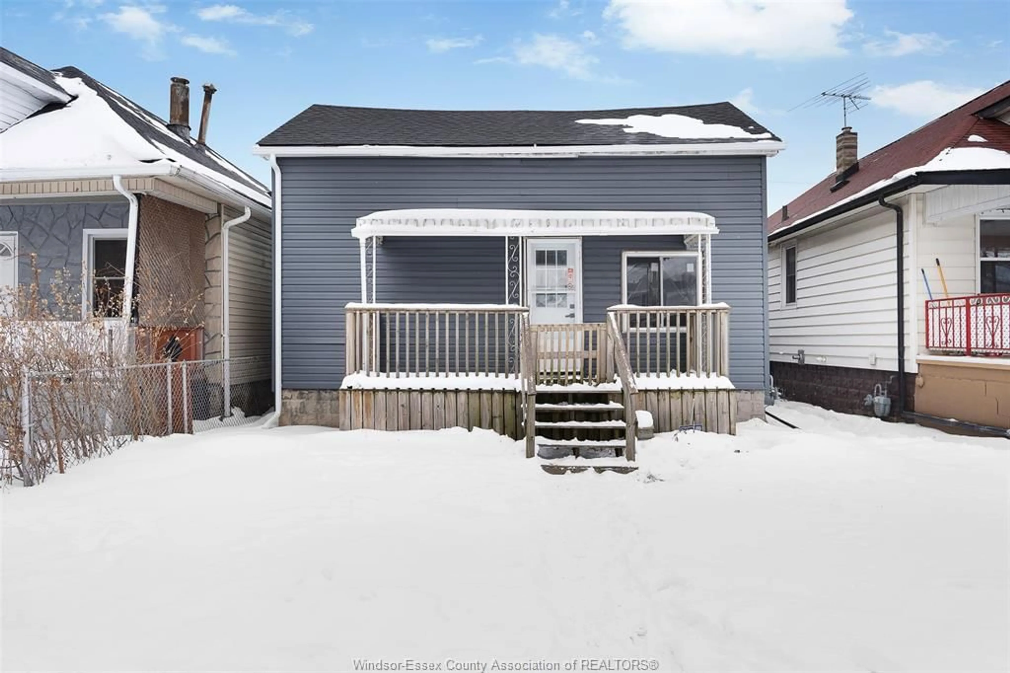 Home with vinyl exterior material, street for 1055 HIGHLAND Ave, Windsor Ontario N9A 1R6