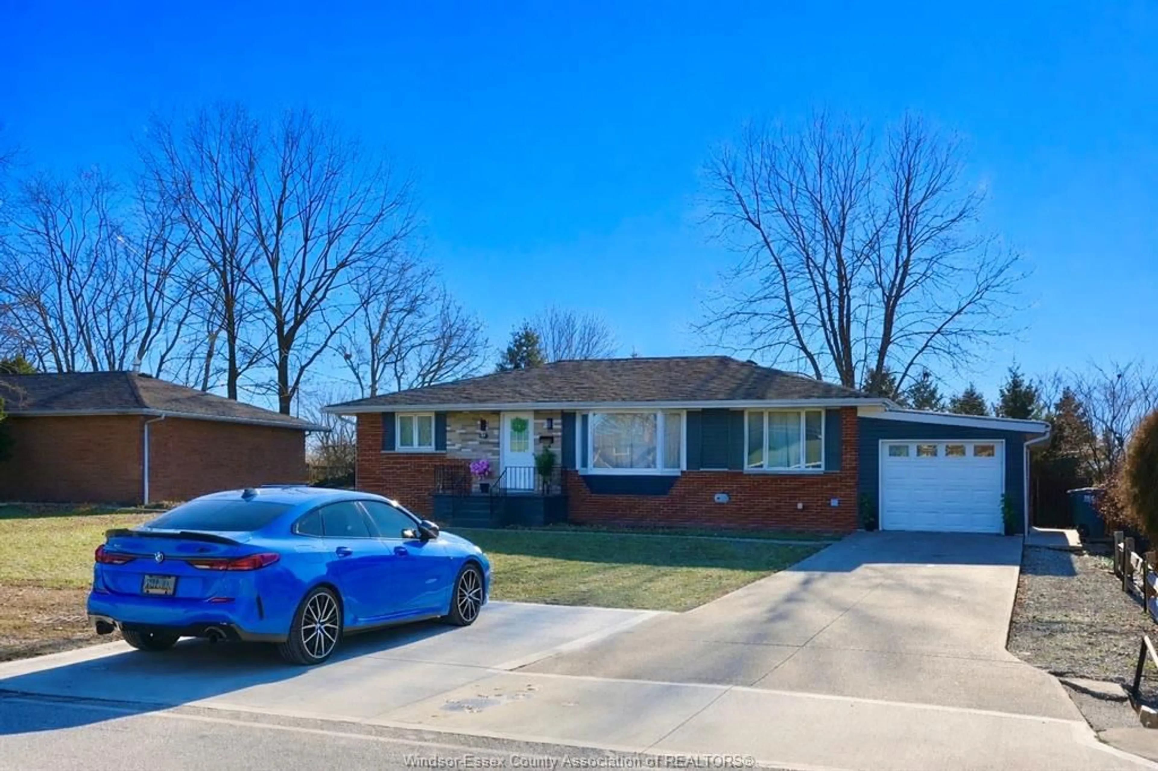 Home with brick exterior material, street for 310 MARTIN Lane, LaSalle Ontario N9J 2M3