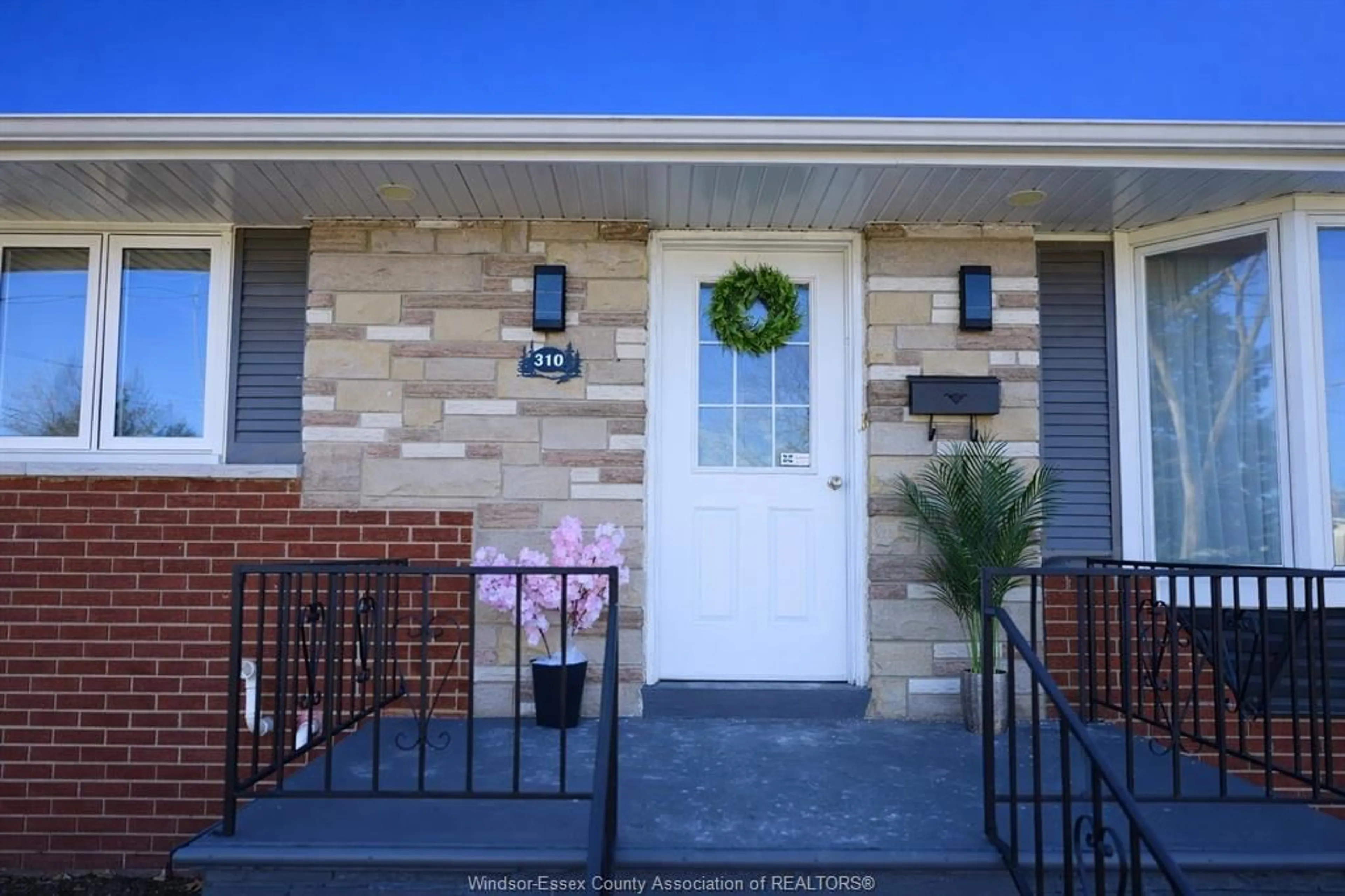 Home with brick exterior material, street for 310 MARTIN Lane, LaSalle Ontario N9J 2M3