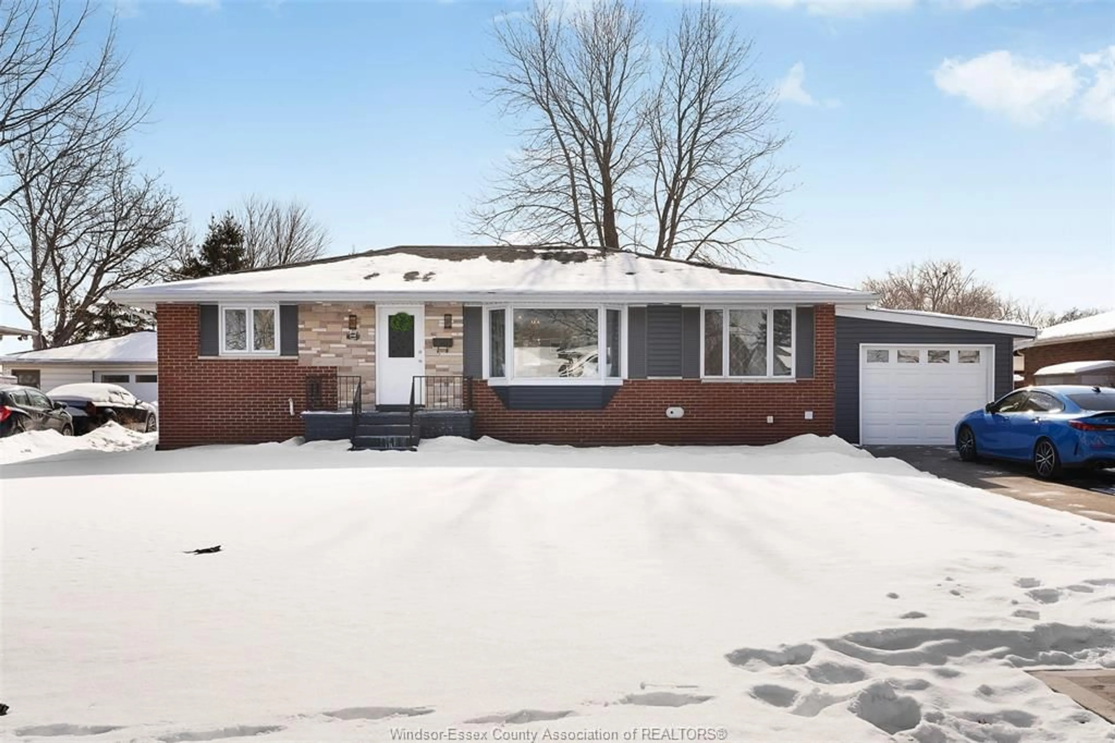 Home with brick exterior material, street for 310 MARTIN Lane, LaSalle Ontario N9J 2M3