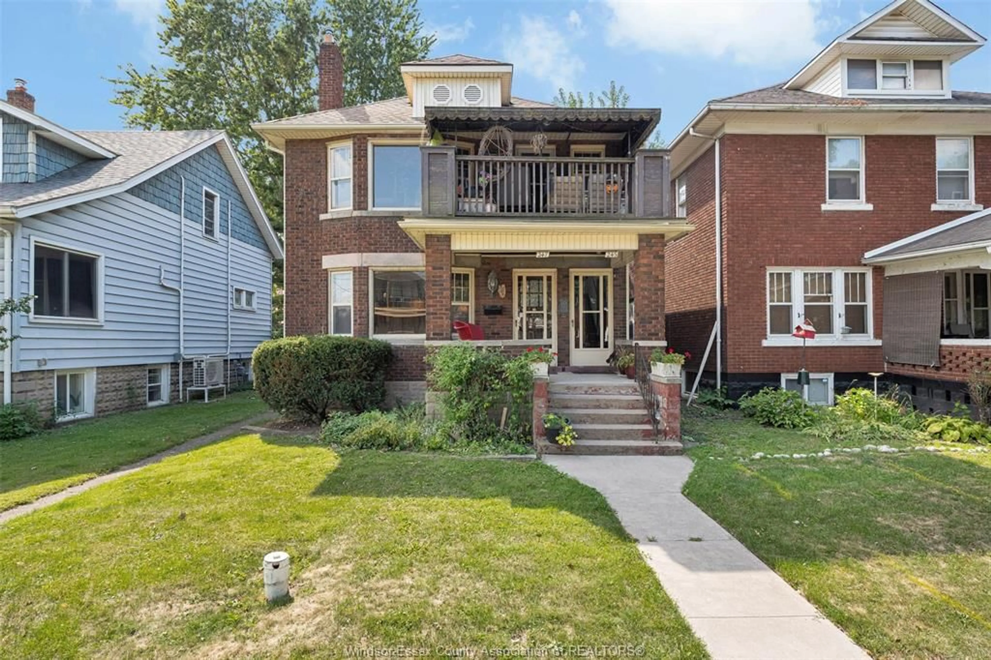 Home with brick exterior material, street for 245-247 MCEWAN, Windsor Ontario N9B 2E3