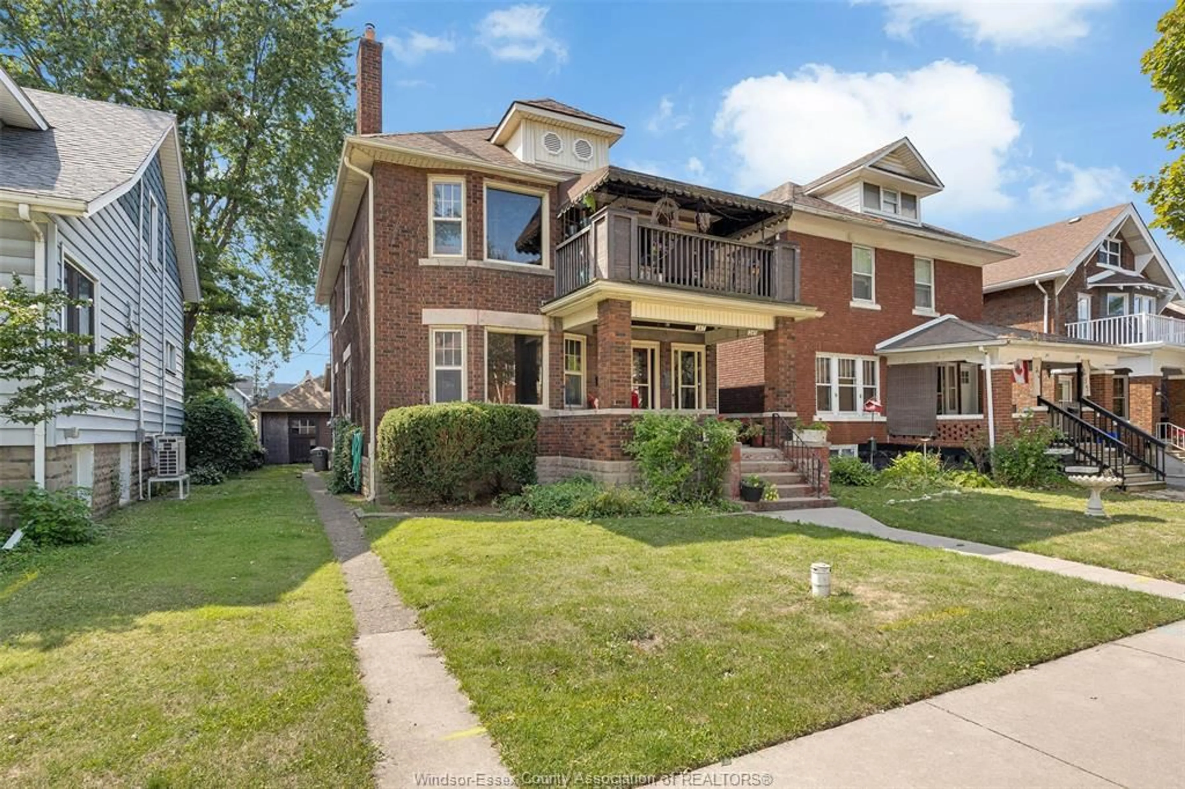 Home with brick exterior material, street for 245-247 MCEWAN, Windsor Ontario N9B 2E3