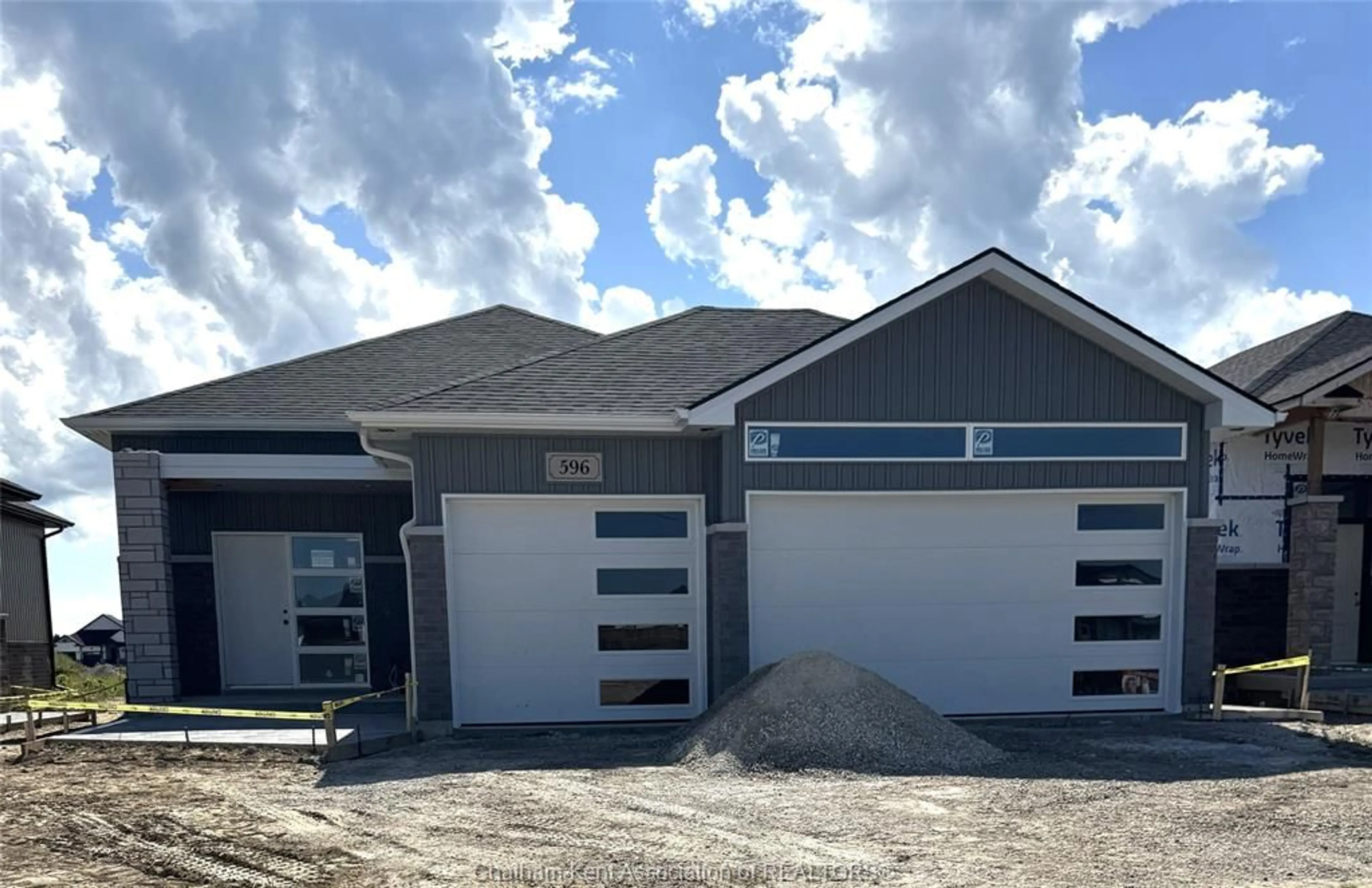 Home with vinyl exterior material, street for 596 INDIAN CREEK Rd, Chatham Ontario N7M 5J5