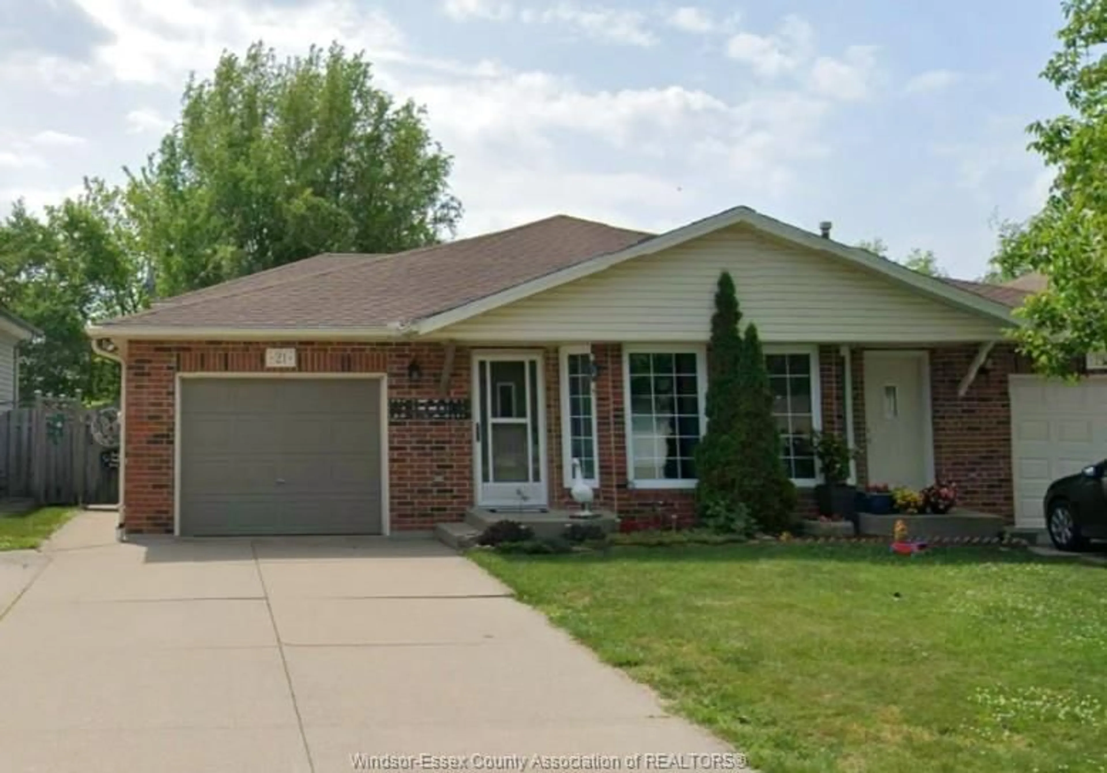 Home with brick exterior material, street for 21 BRIARWOOD Ave, Leamington Ontario N8H 5G2
