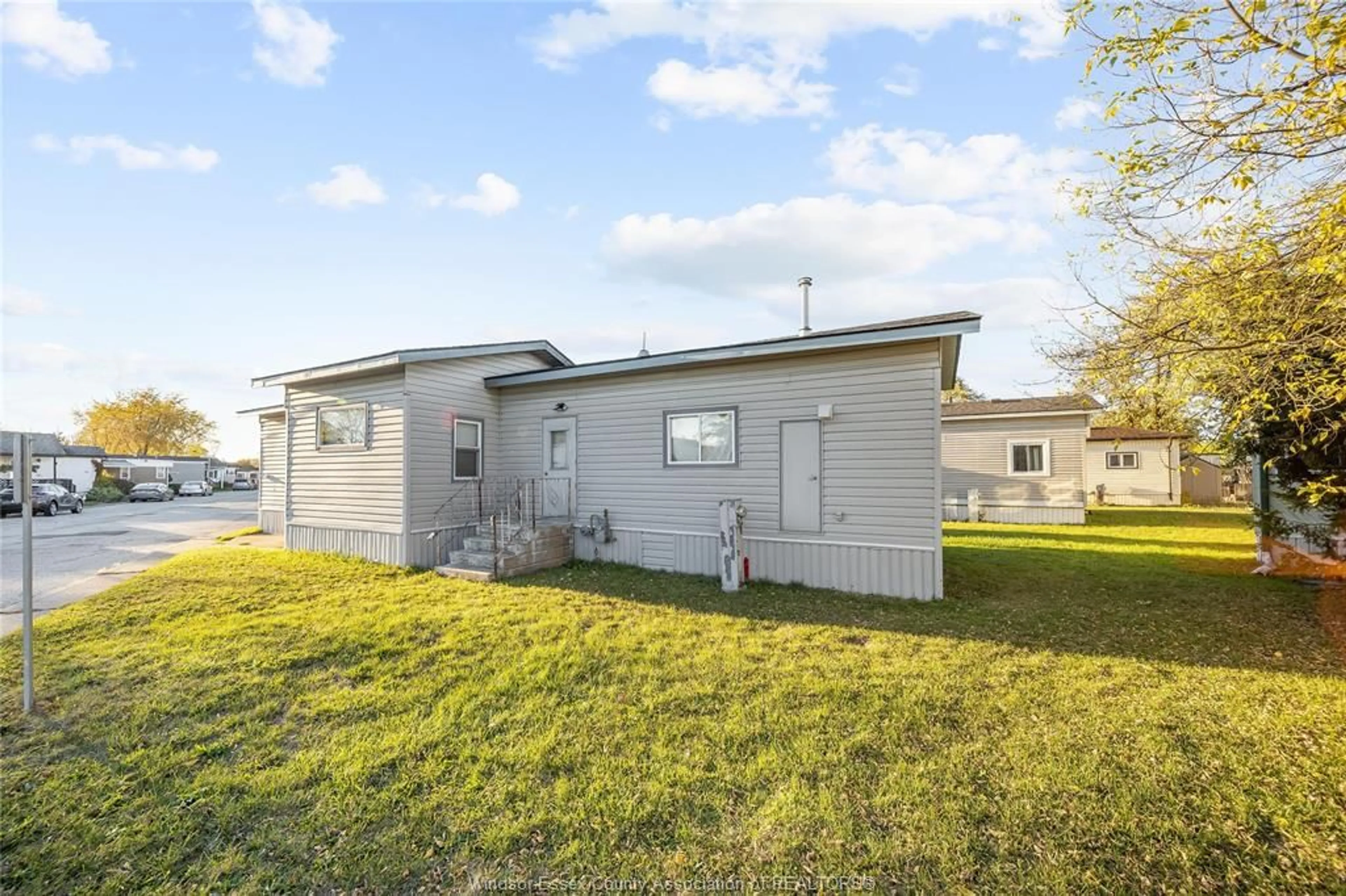 A pic from outside/outdoor area/front of a property/back of a property/a pic from drone, building for 56 HOLLY St, Lakeshore Ontario N8N 2V1