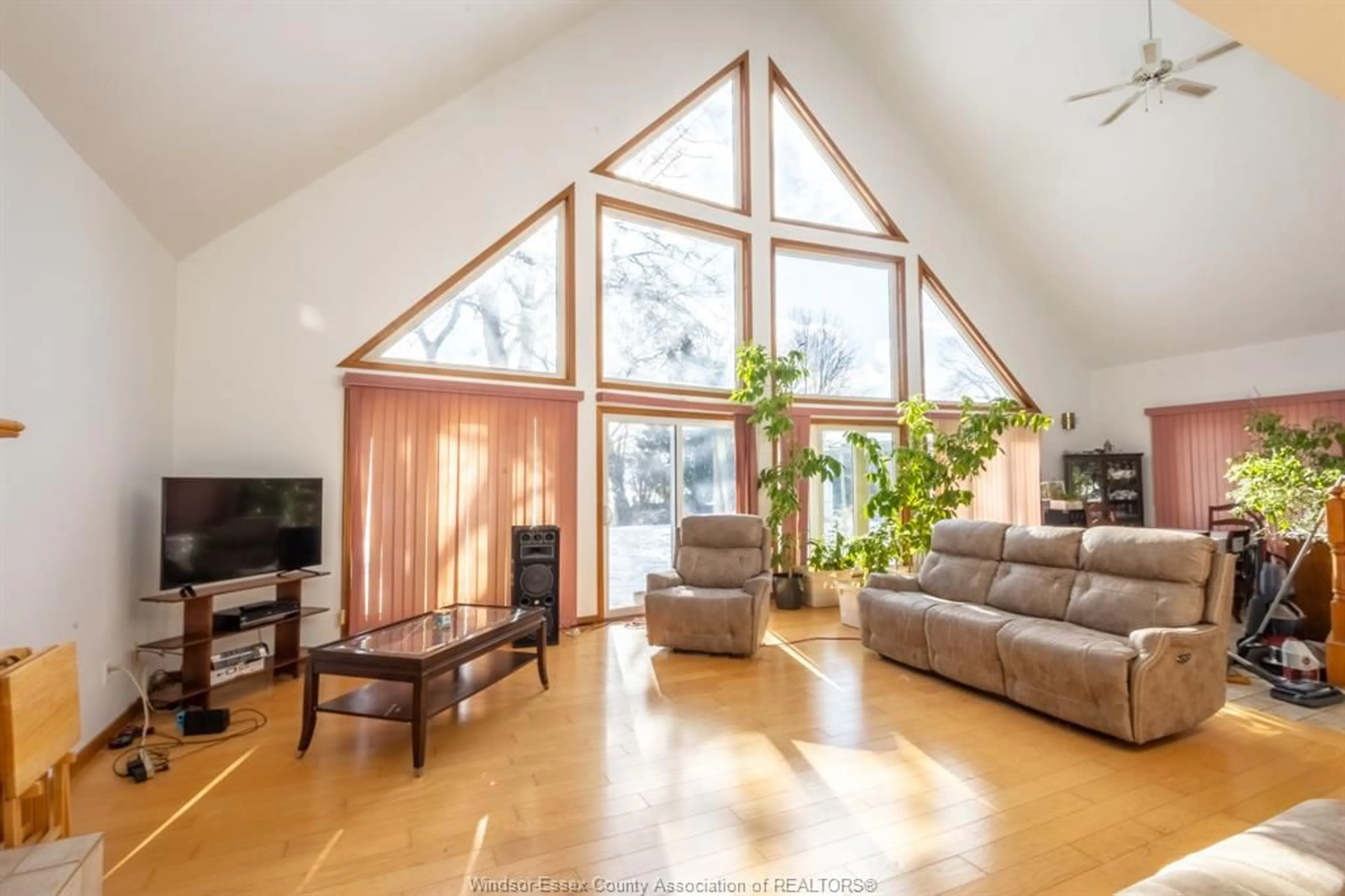 Living room with furniture, wood/laminate floor for 3280 TALBOT Trail, Wheatley Ontario N0P 2P0