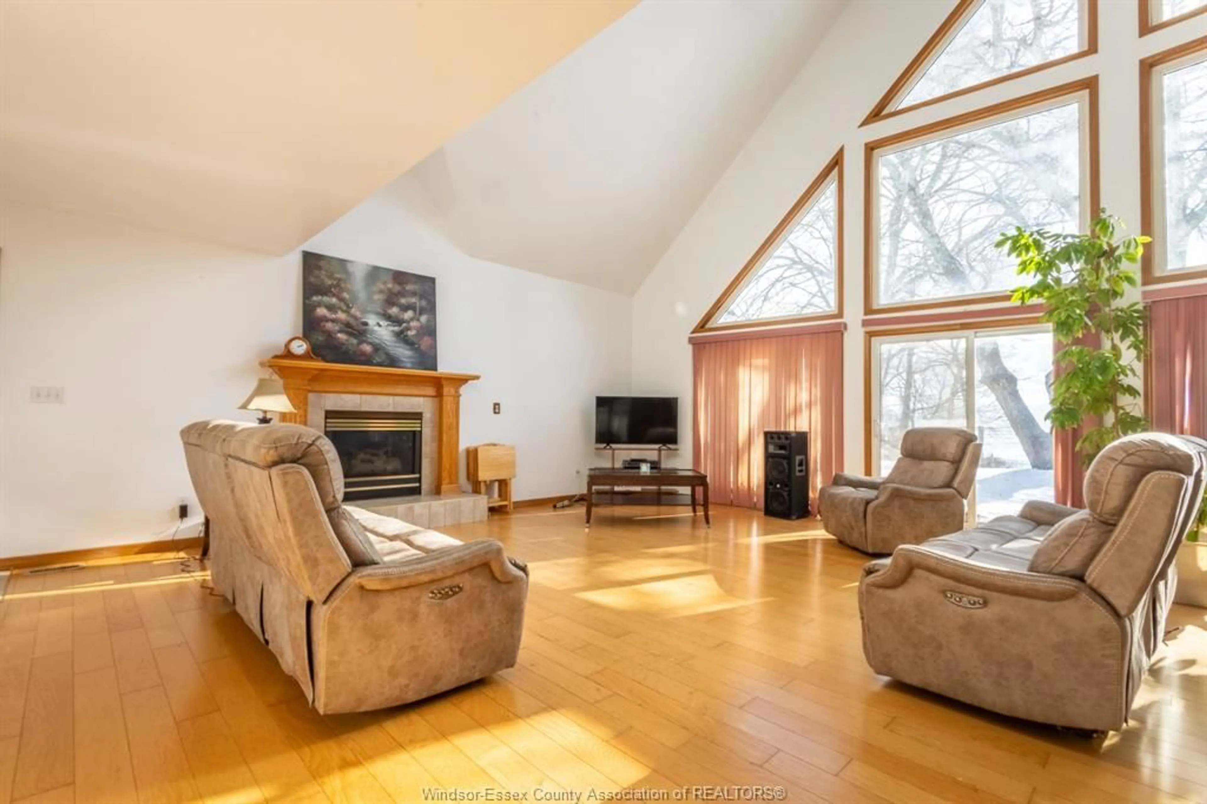 Living room with furniture, wood/laminate floor for 3280 TALBOT Trail, Wheatley Ontario N0P 2P0