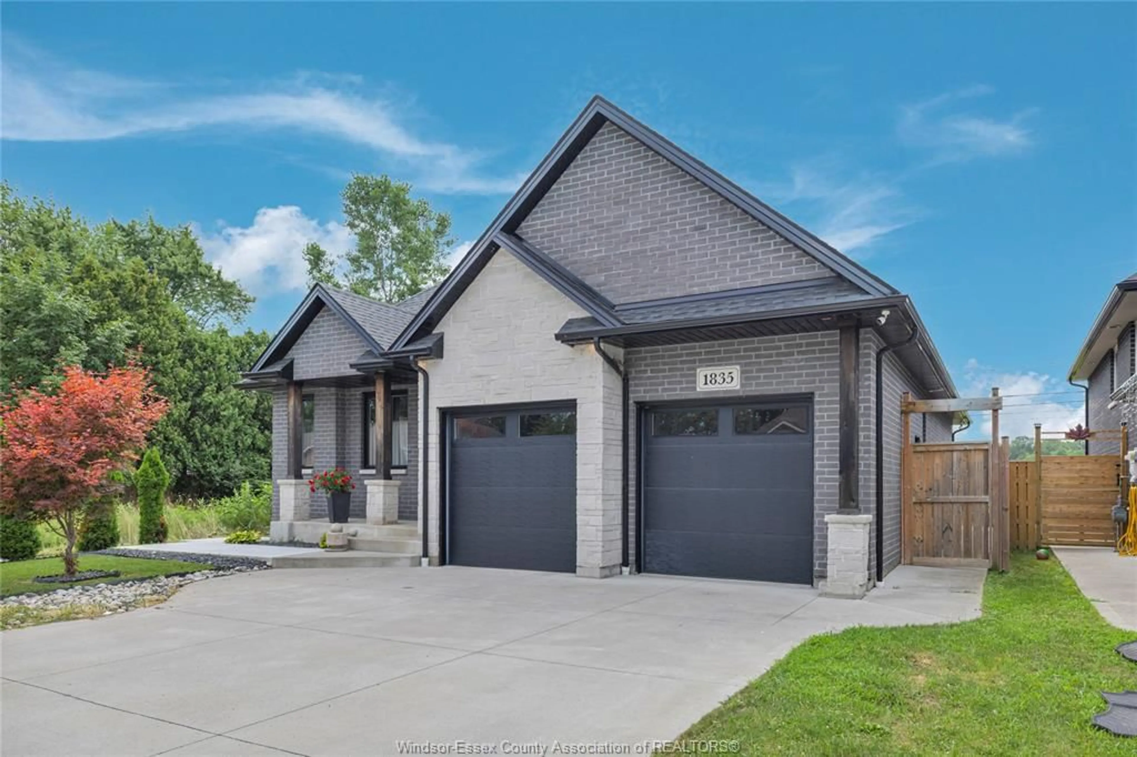 Home with brick exterior material, street for 1835 DOMINION Blvd, Windsor Ontario N9B 3H8