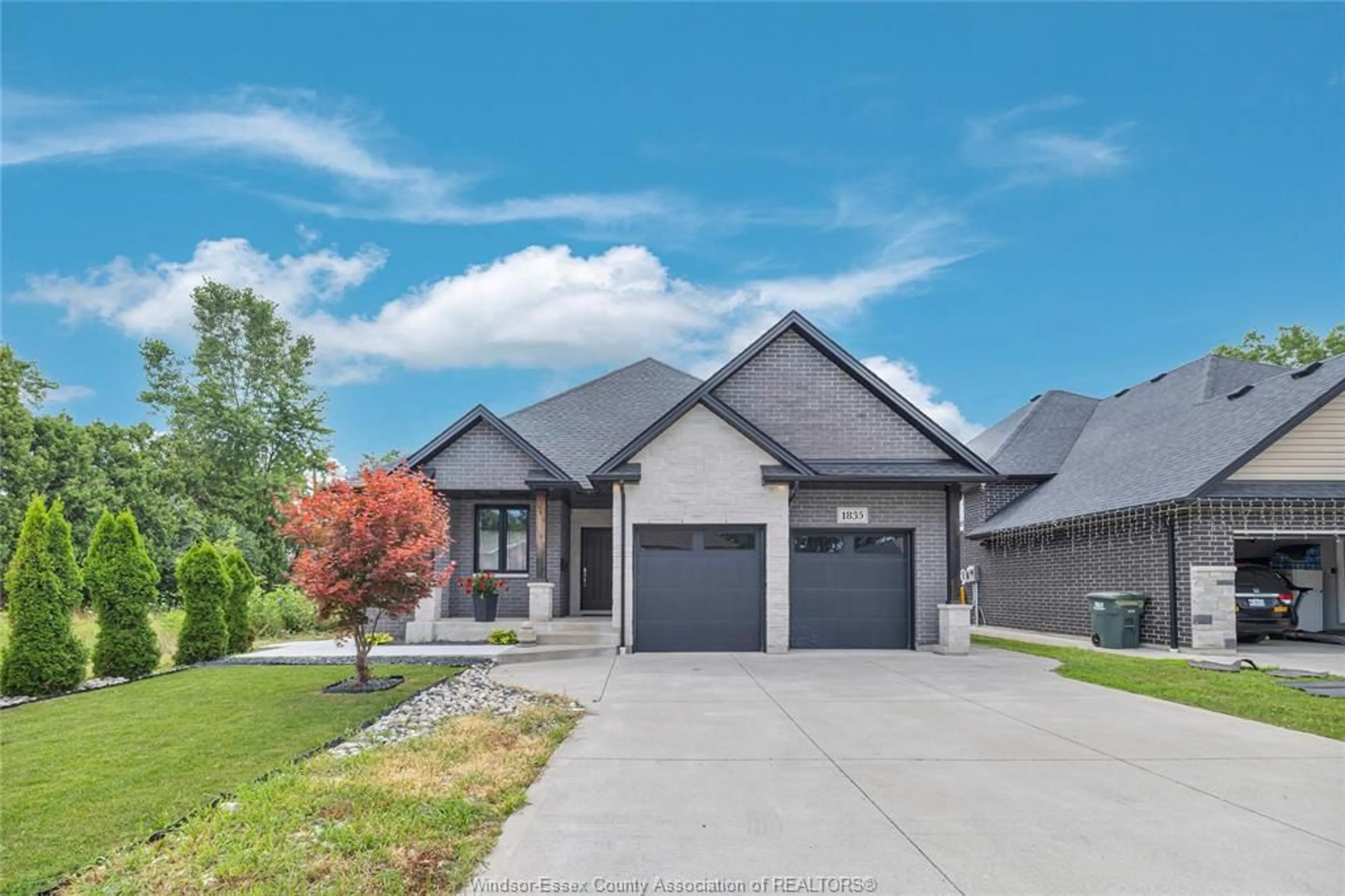 Home with brick exterior material, street for 1835 DOMINION Blvd, Windsor Ontario N9B 3H8