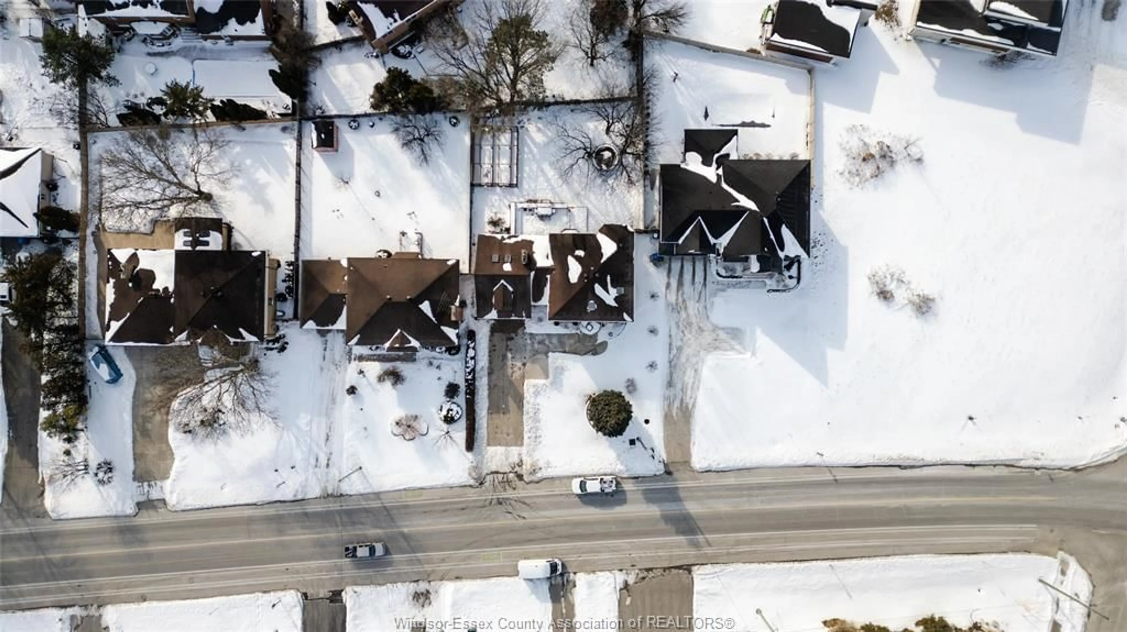 A pic from outside/outdoor area/front of a property/back of a property/a pic from drone, street for 233 Old Tecumseh Rd, Lakeshore Ontario N8N 3S9