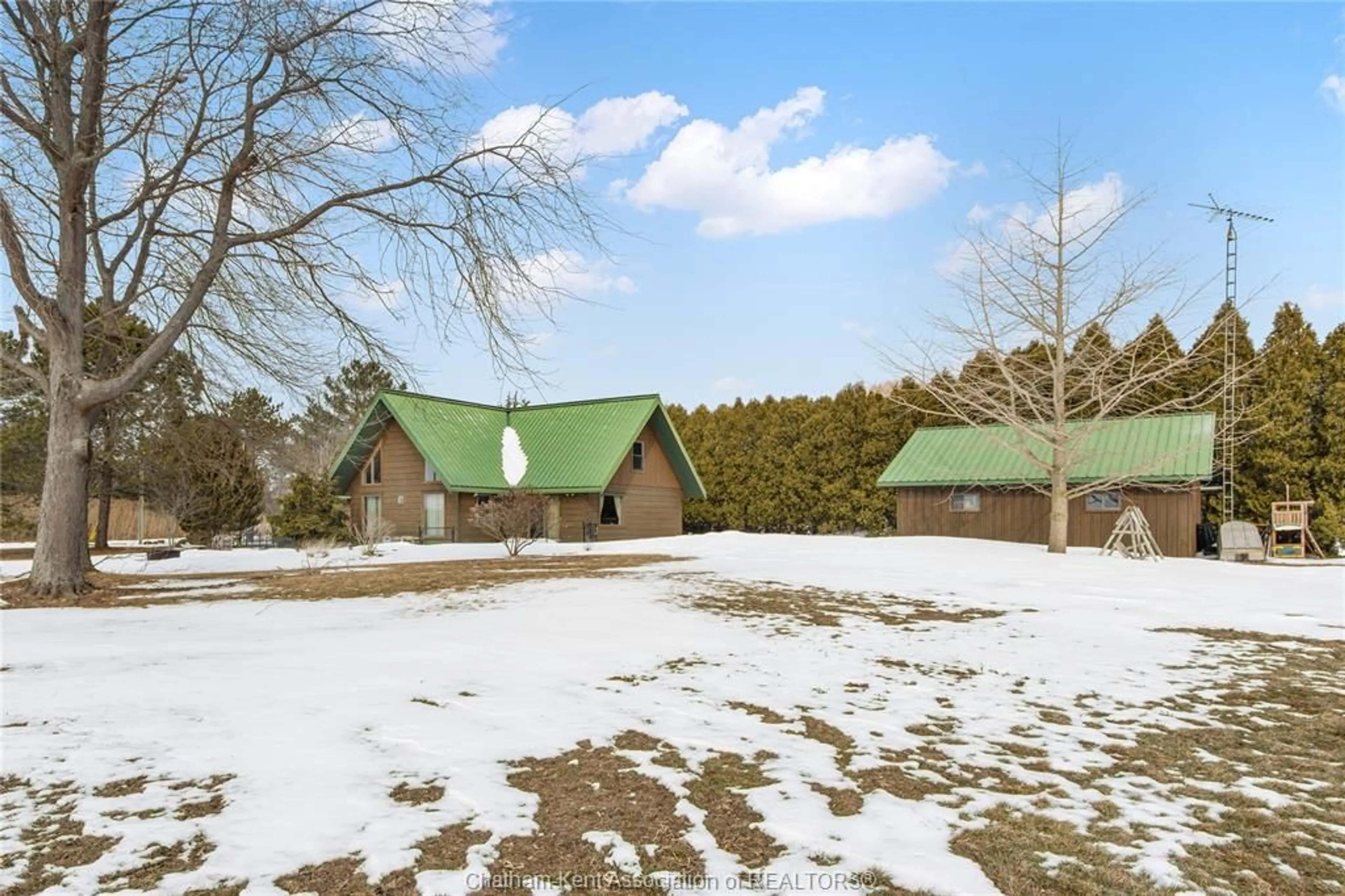 A pic from outside/outdoor area/front of a property/back of a property/a pic from drone, mountain view for 11280 RONDEAU ESTATES Line, Morpeth Ontario N0P 1X0