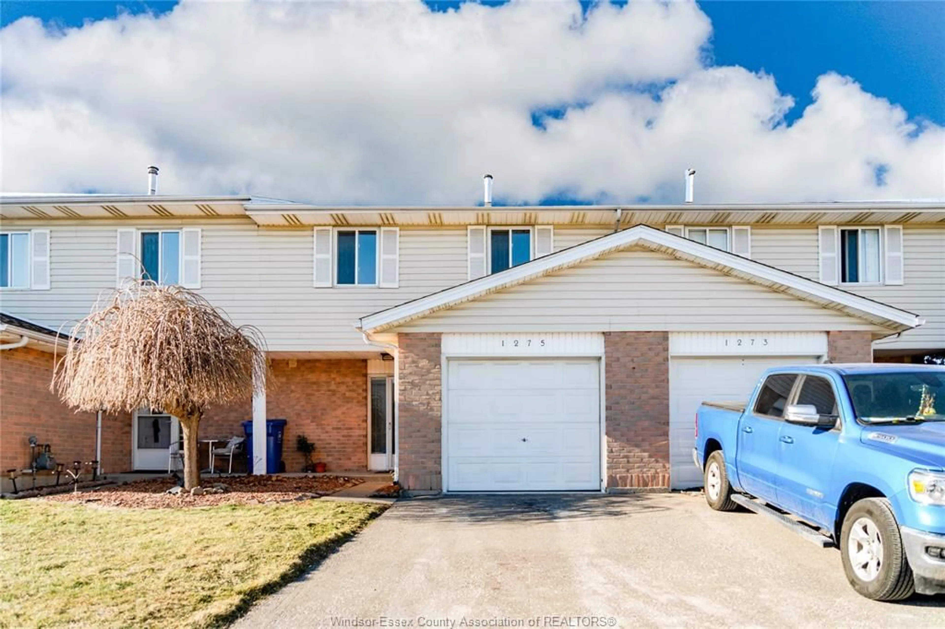 Home with brick exterior material, street for 1275 CARDINAL Cres #32, Tecumseh Ontario N8N 4V1