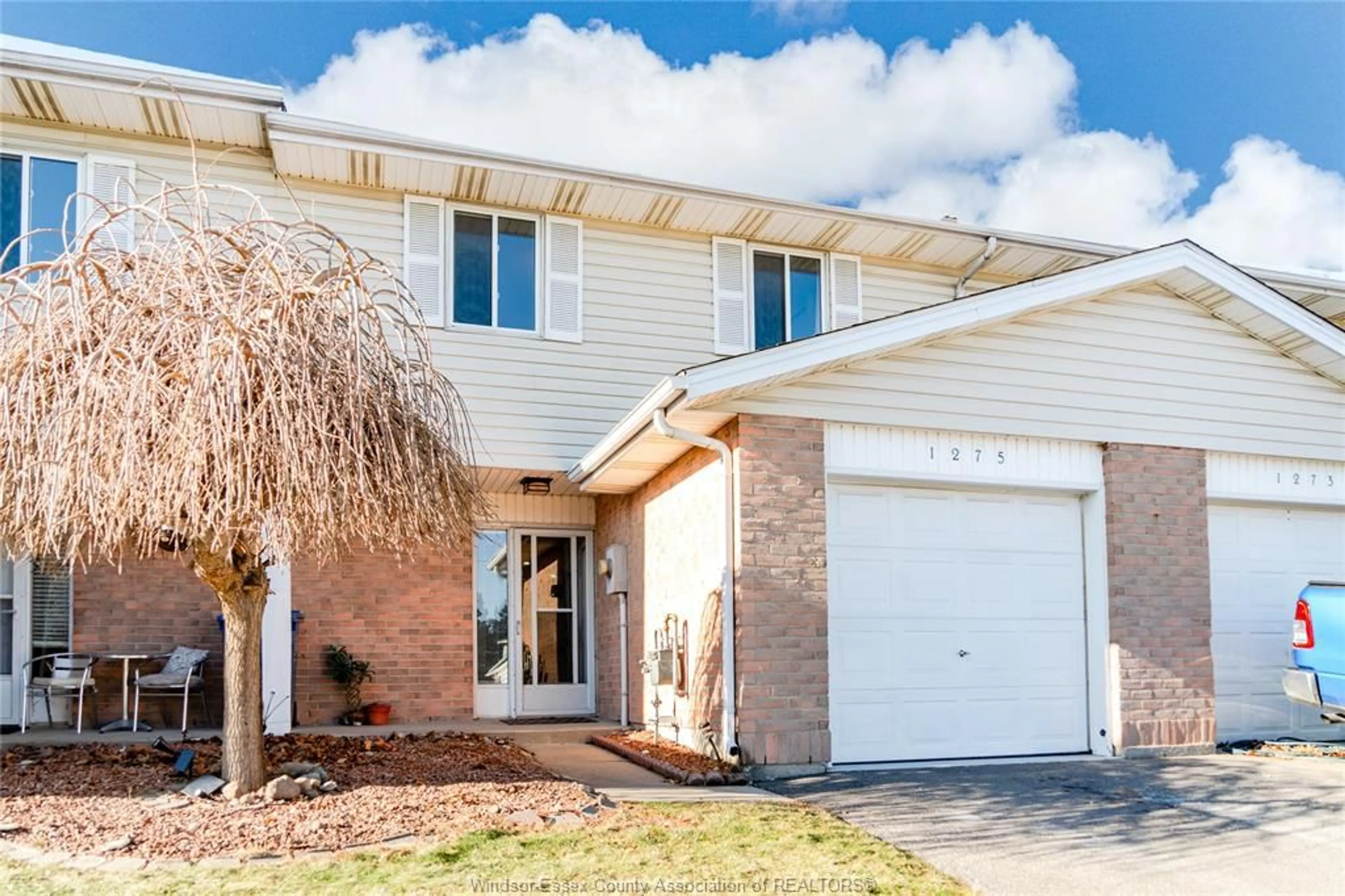 Home with brick exterior material, street for 1275 CARDINAL Cres #32, Tecumseh Ontario N8N 4V1