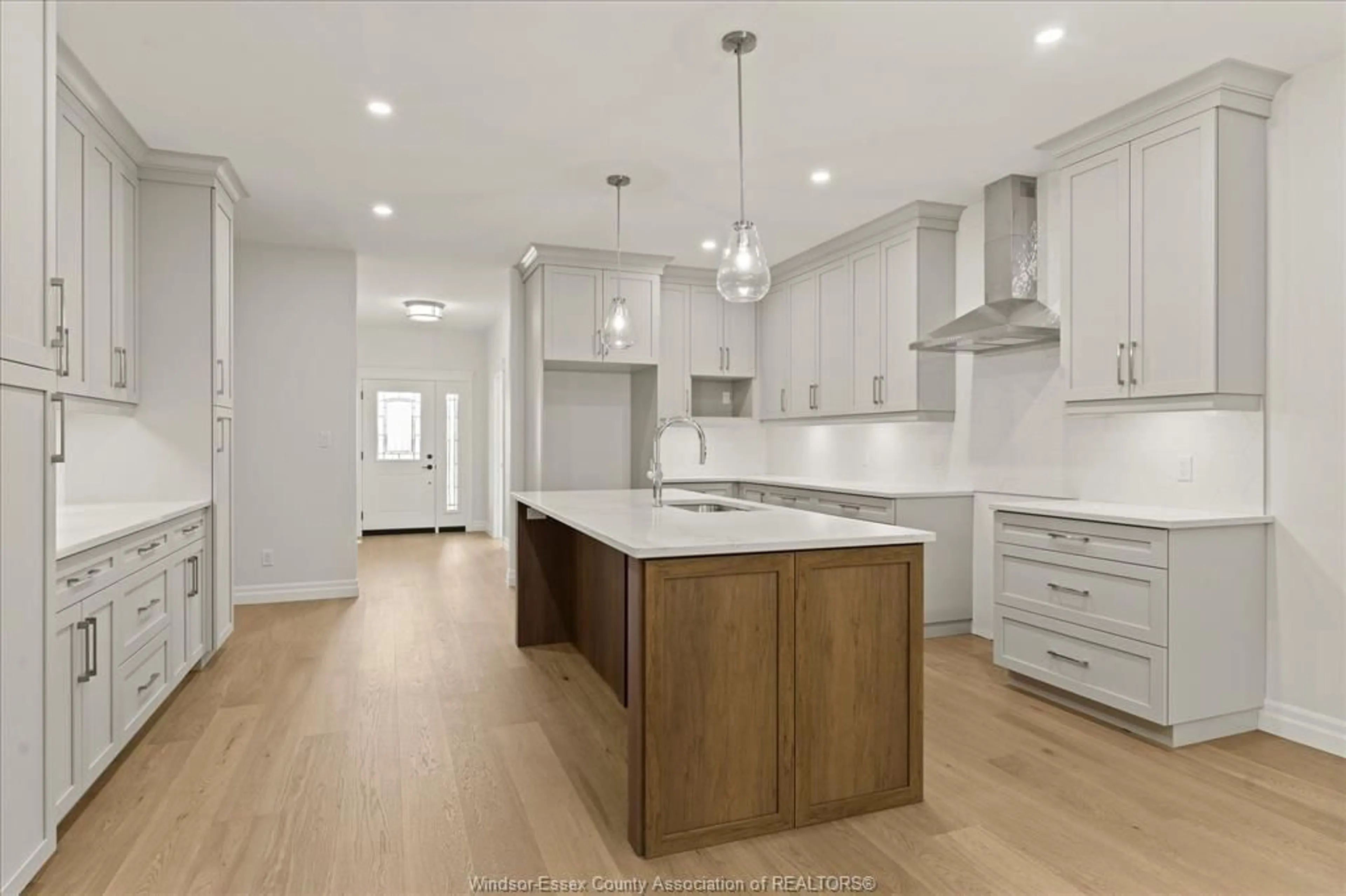 Open concept kitchen, wood/laminate floor for 3255 TULLIO Dr, LaSalle Ontario N9H 1H3