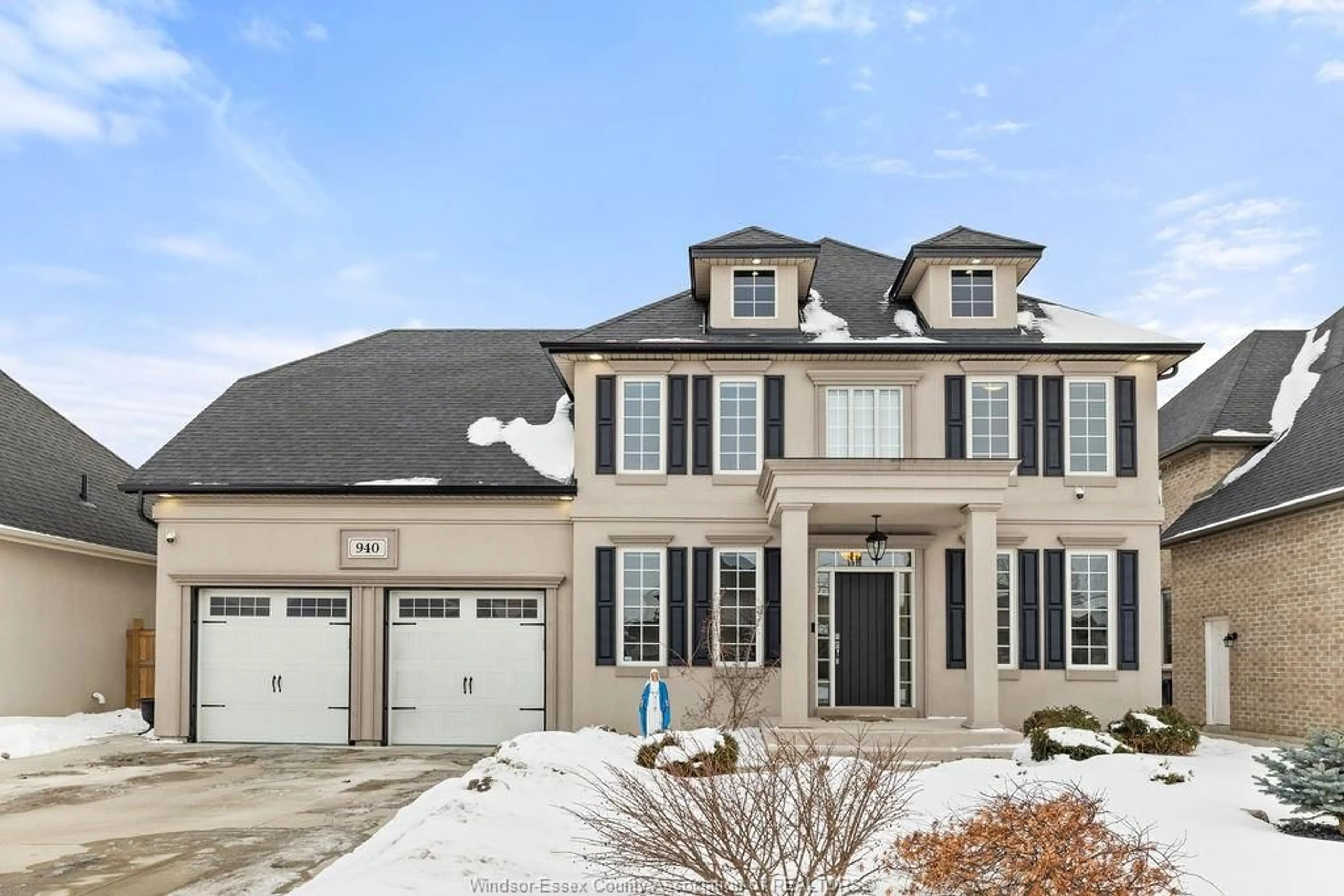 Home with brick exterior material, street for 940 WESTWOOD Dr, Lakeshore Ontario N0R 1A0