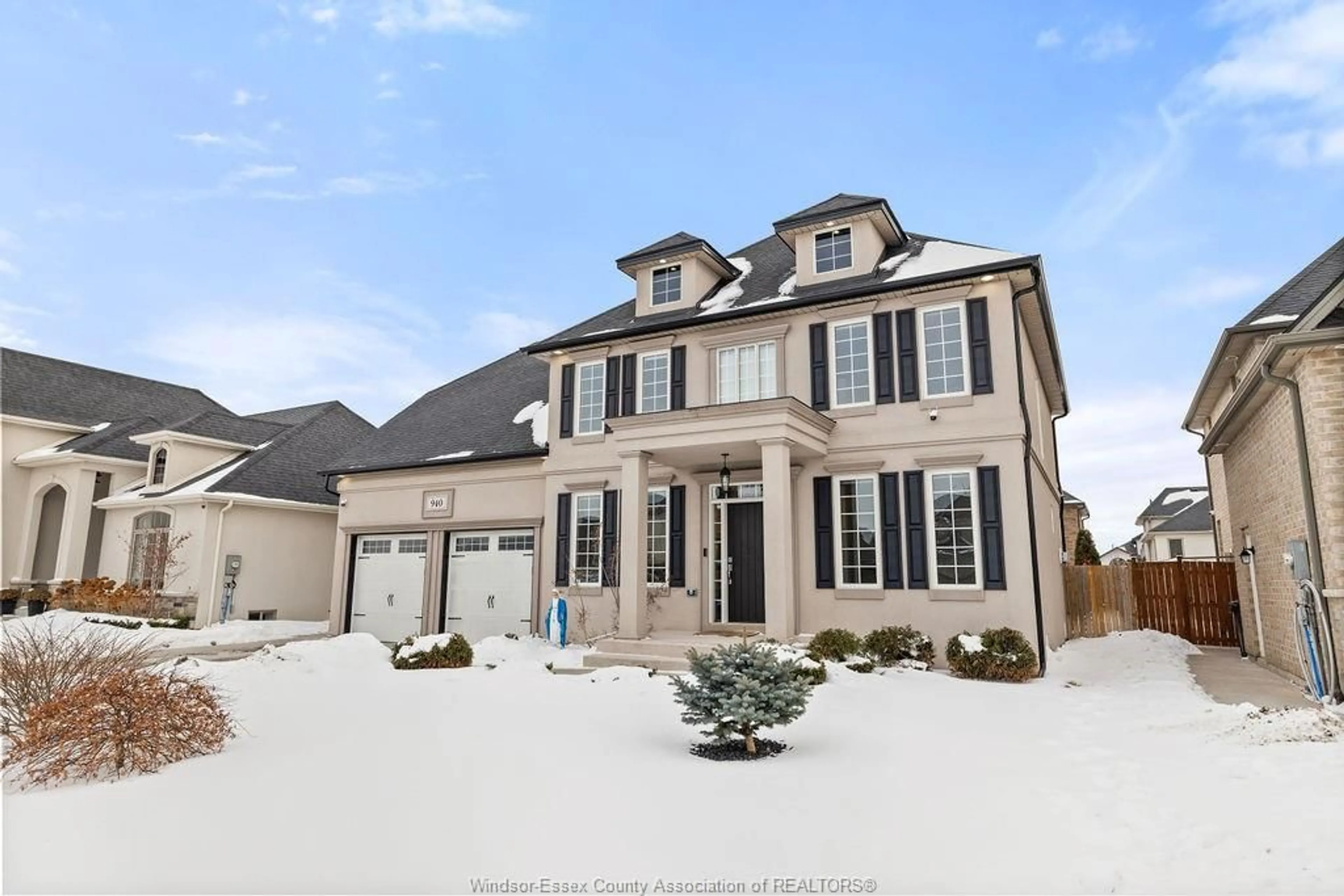 Home with vinyl exterior material, street for 940 WESTWOOD Dr, Lakeshore Ontario N0R 1A0