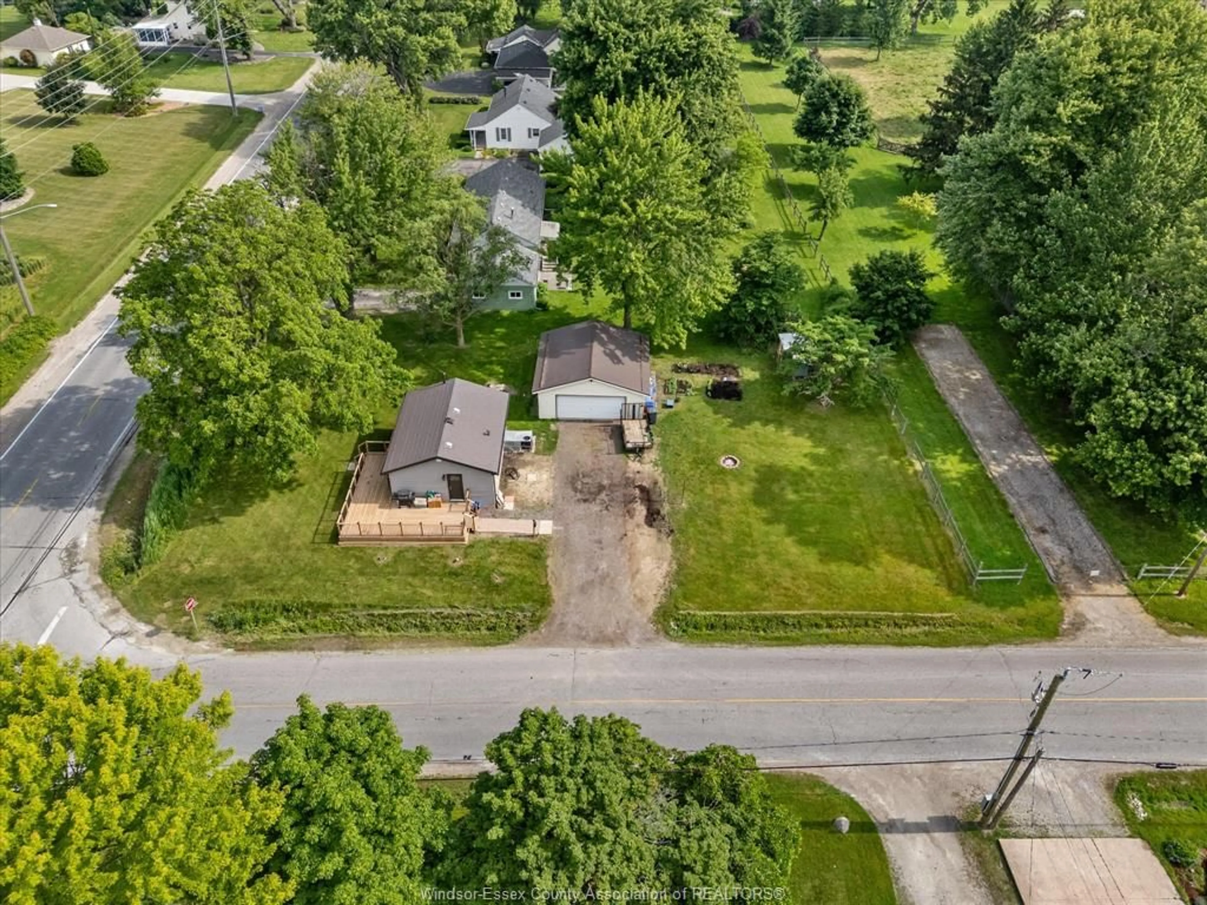 A pic from outside/outdoor area/front of a property/back of a property/a pic from drone, street for 8650 Malden Rd, LaSalle Ontario N9J 2V7