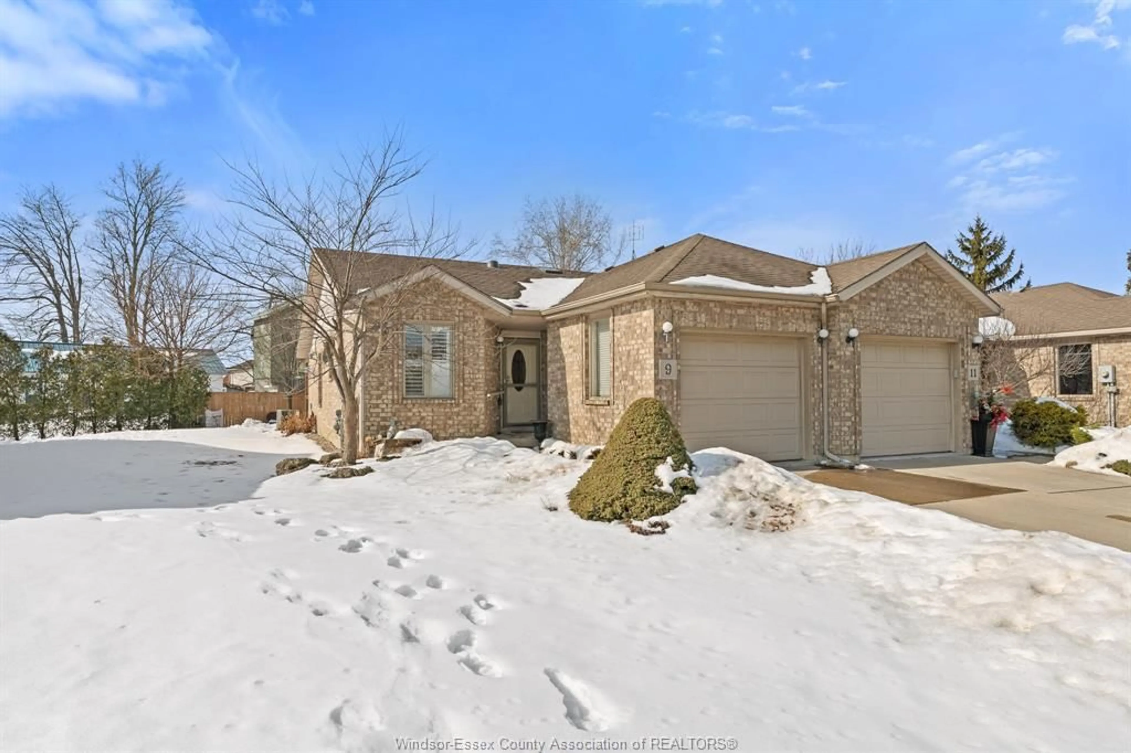 A pic from outside/outdoor area/front of a property/back of a property/a pic from drone, street for 9 Malibu Dr, Leamington Ontario N8H 5G4