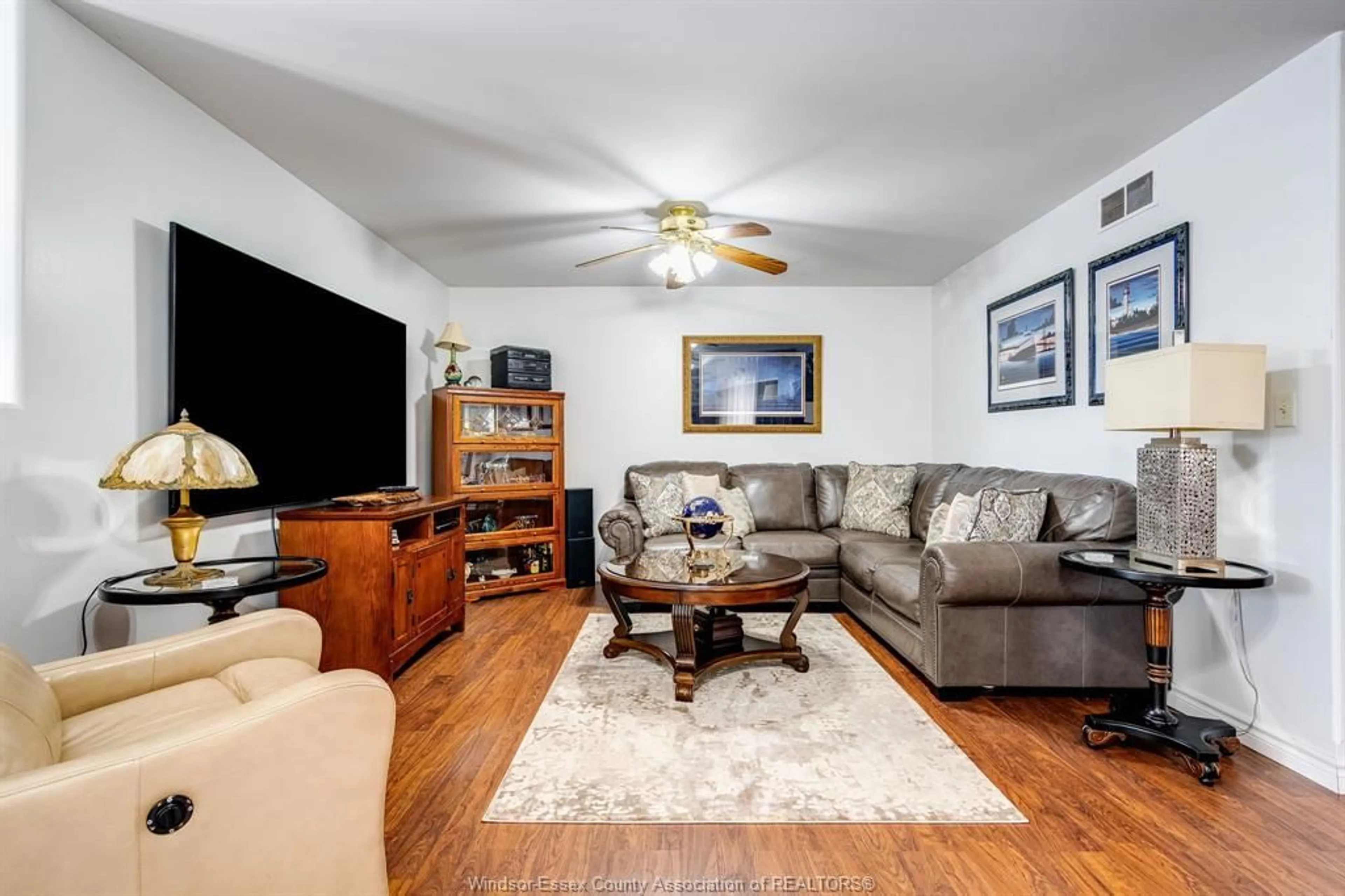 Living room with furniture, unknown for 71 Satinwood Cres, Leamington Ontario N8H 4P1