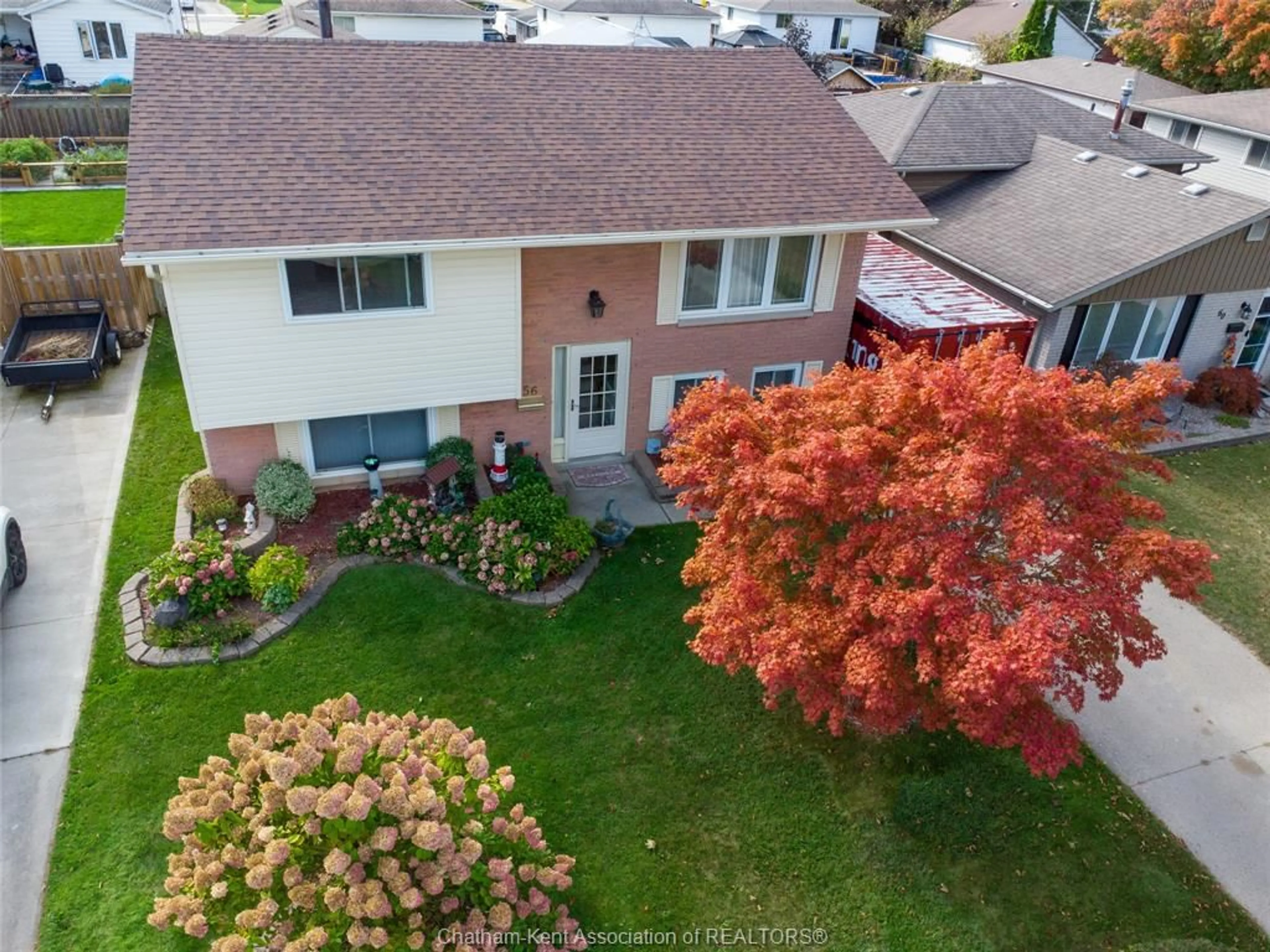 A pic from outside/outdoor area/front of a property/back of a property/a pic from drone, street for 56 Rossini Cres, Chatham Ontario N7L 4N3