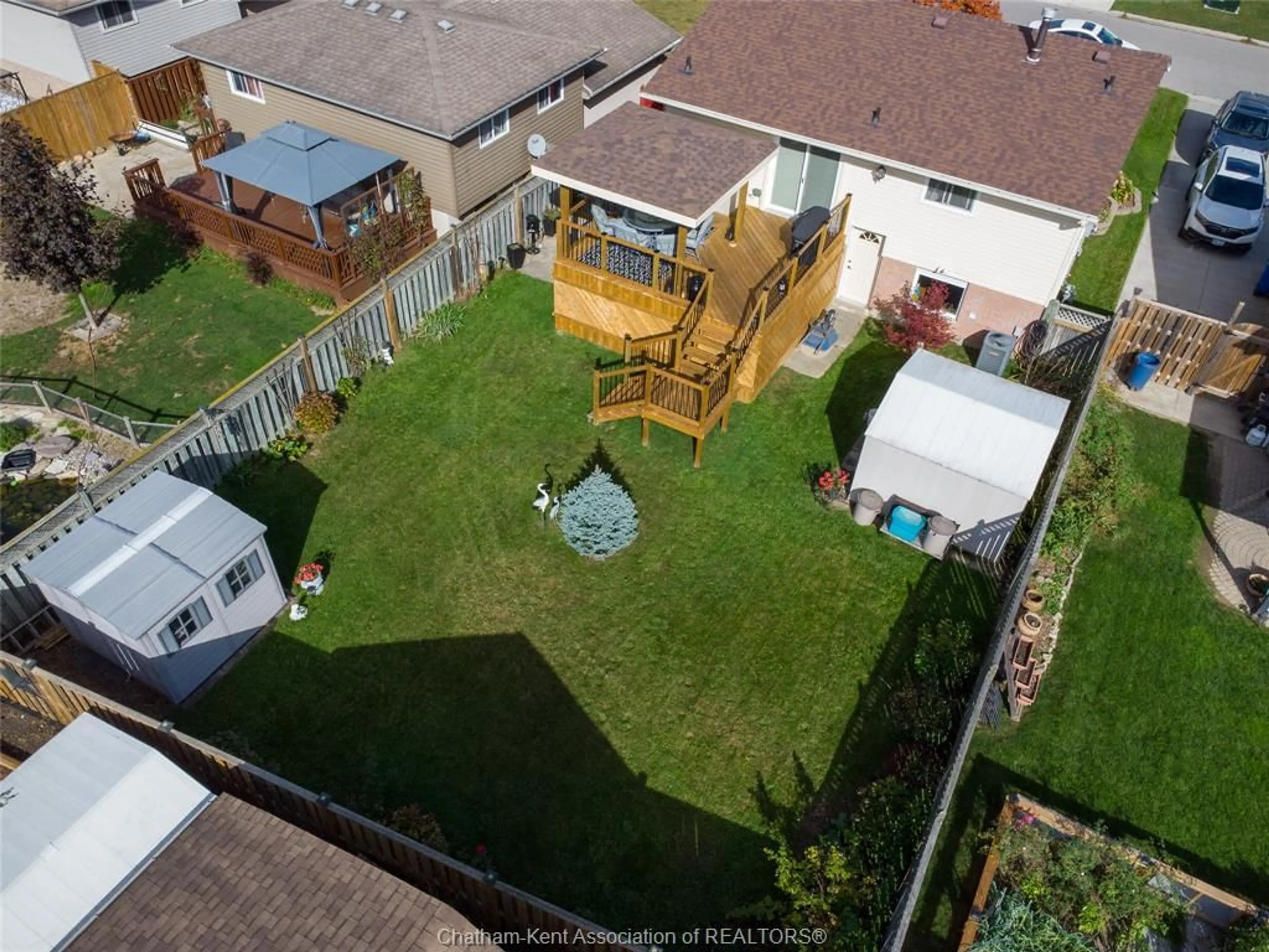 A pic from outside/outdoor area/front of a property/back of a property/a pic from drone, street for 56 Rossini Cres, Chatham Ontario N7L 4N3