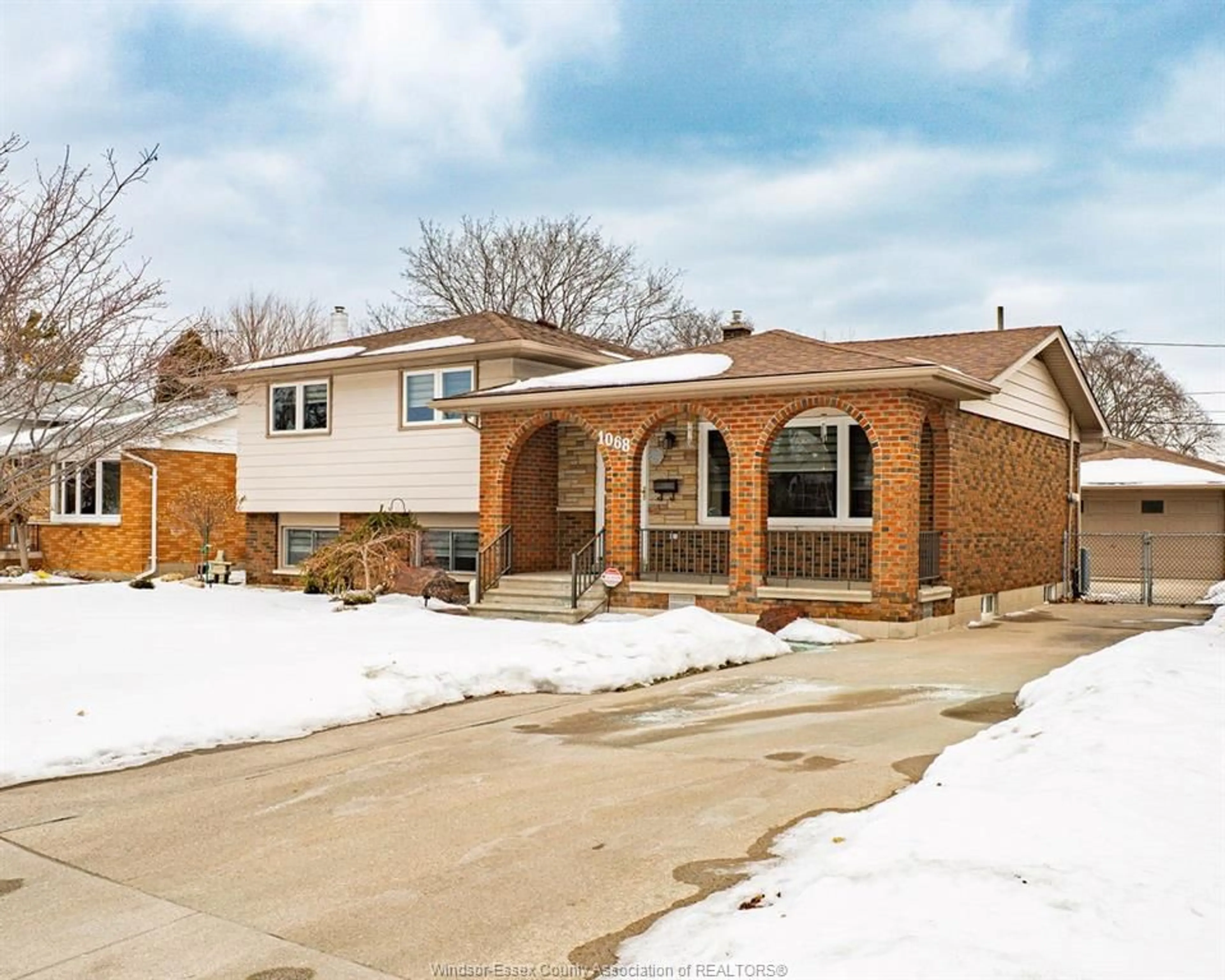 Home with brick exterior material, street for 1068 Frank, Windsor Ontario N8S 3P7